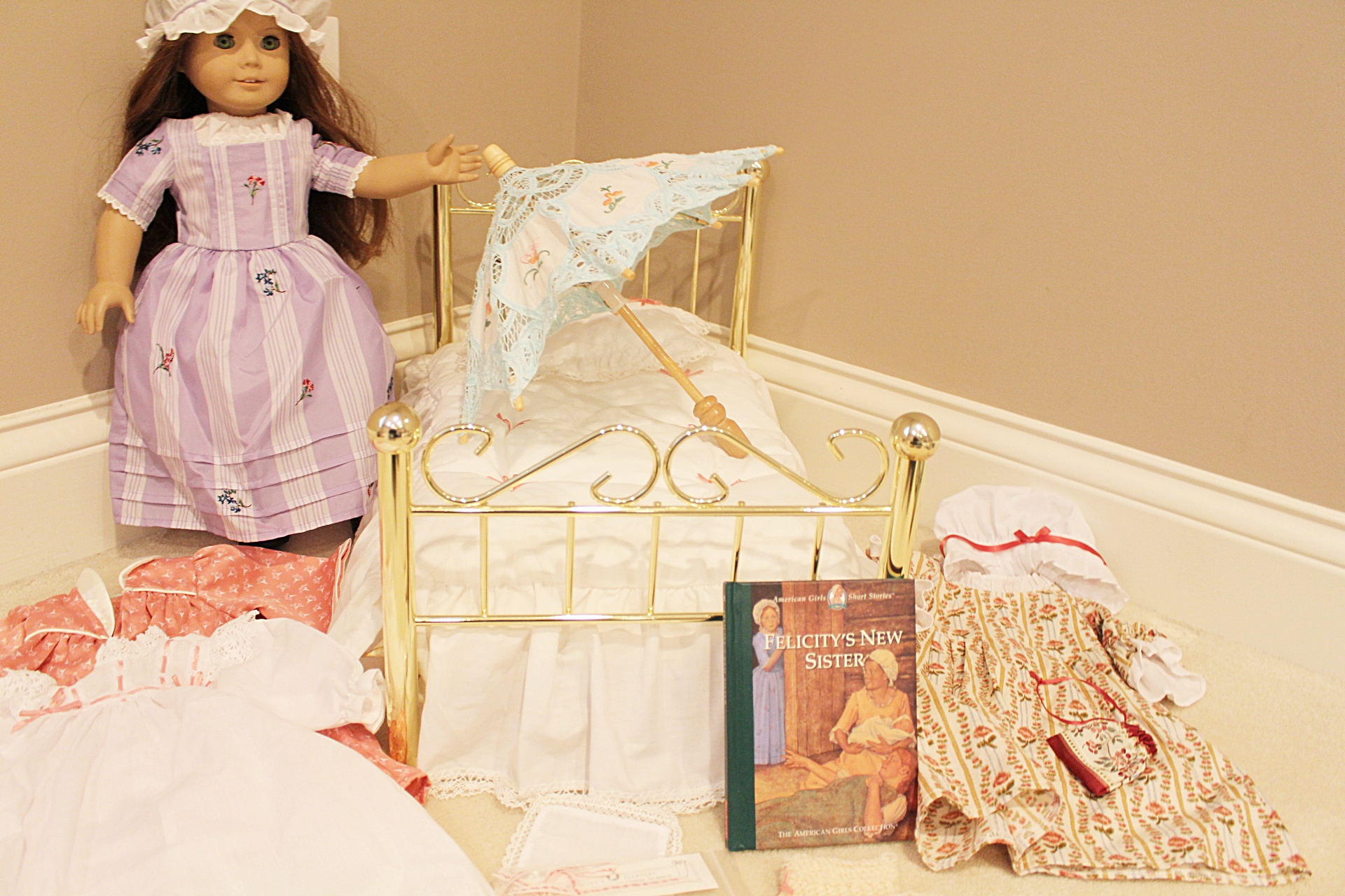 Felicity American Girl Doll, Brass Bed, Book, Umbrella and Two Outfits