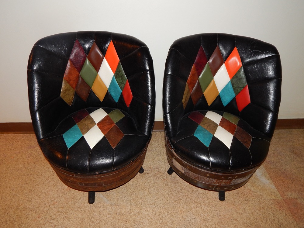 Pair of Whiskey Barrel and Leather-Look Chairs