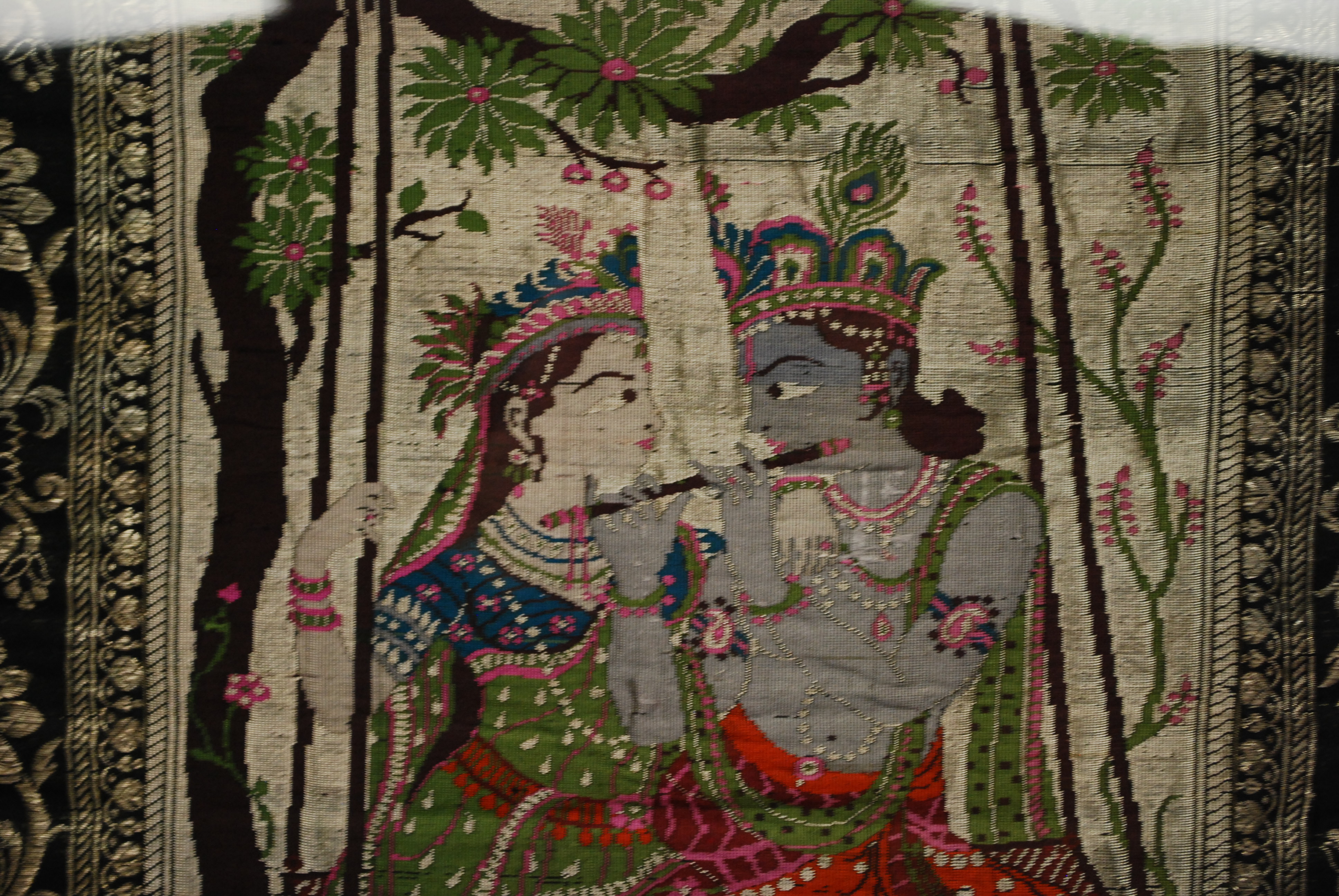 Framed Stitched Art Depicting Radha Krishna on Tree Swing