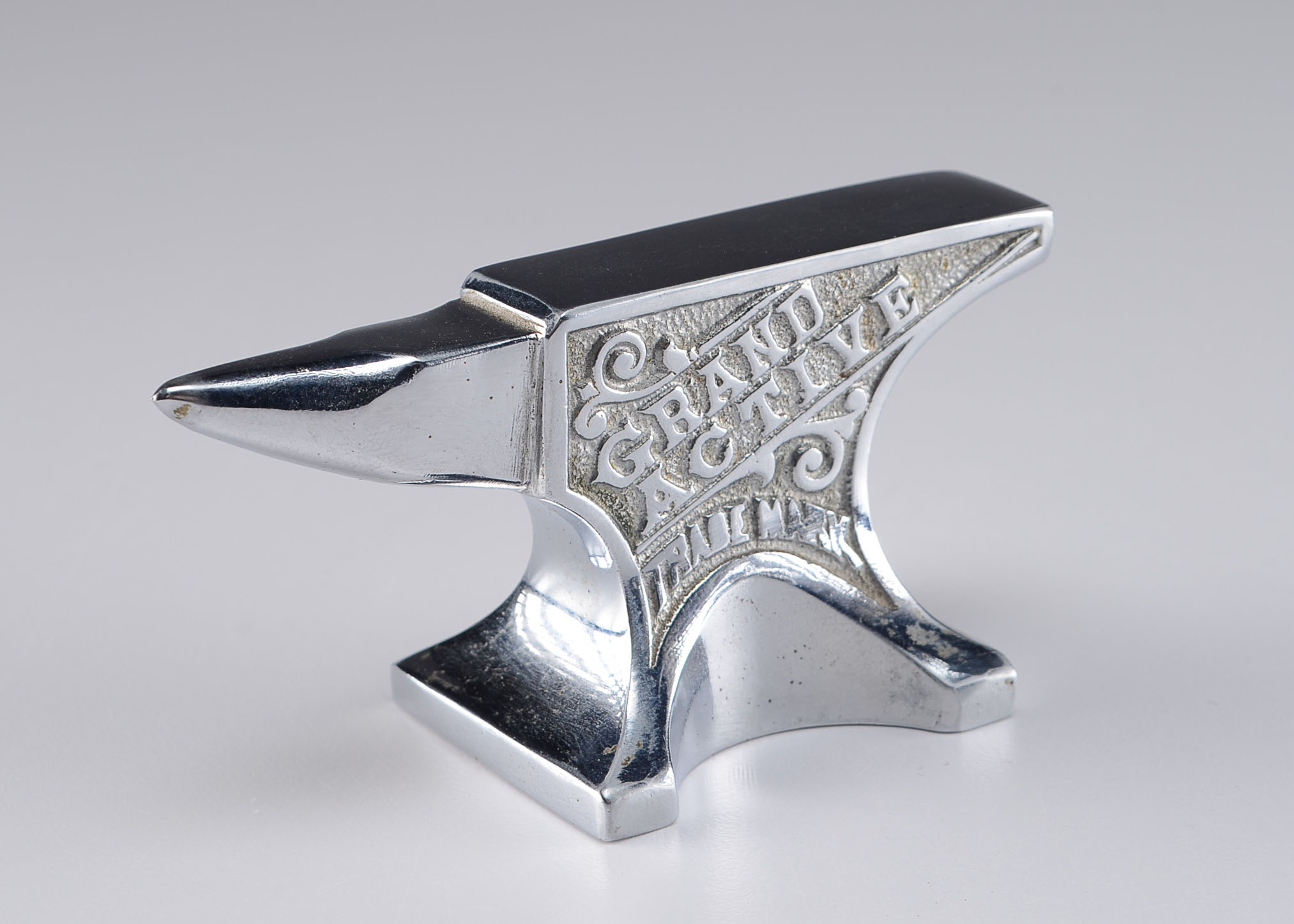 Small Vintage Cast Iron Chrome Paperweight