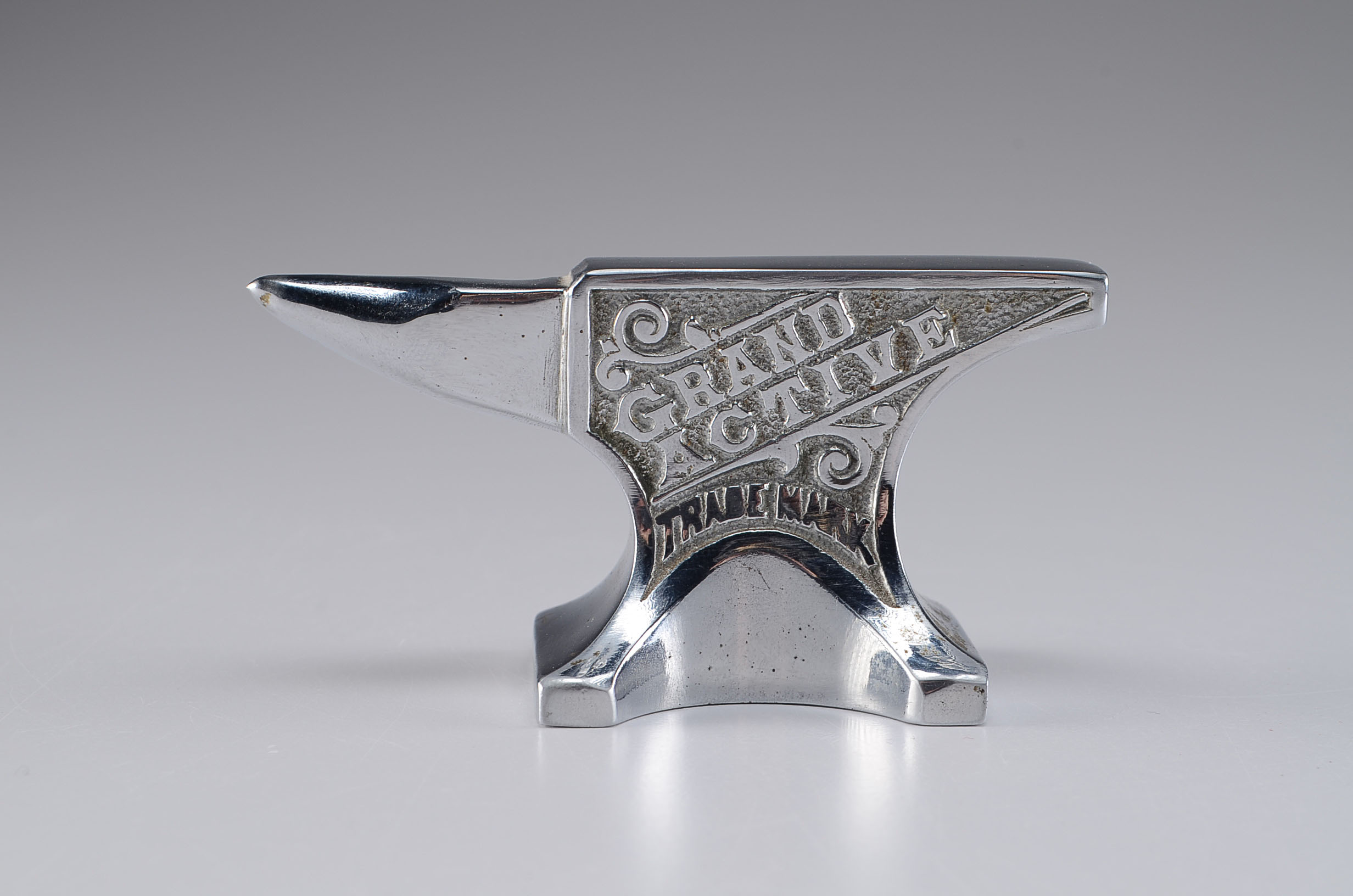 Small Vintage Cast Iron Chrome Paperweight