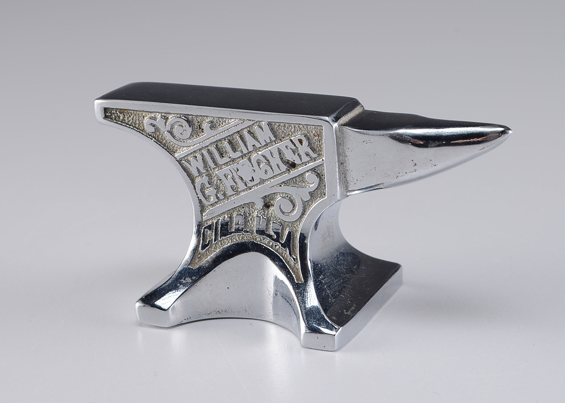 Small Vintage Cast Iron Chrome Paperweight