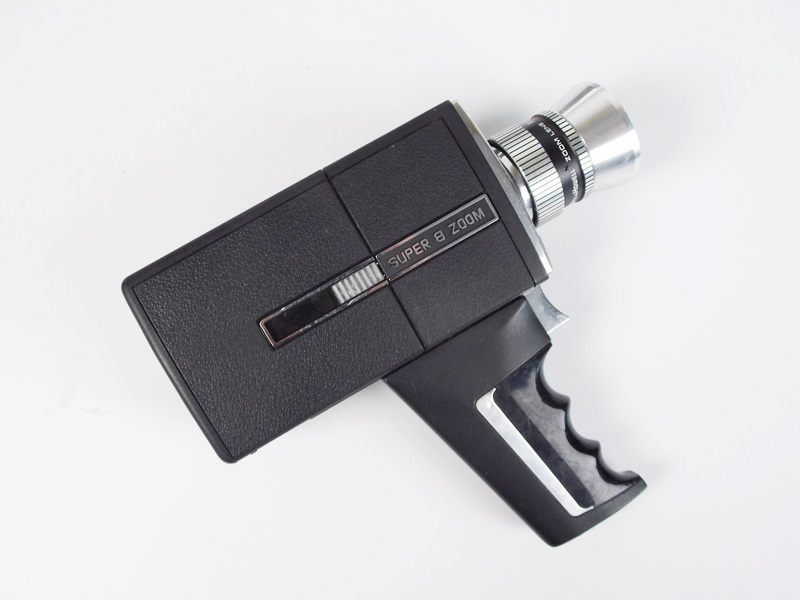 A Vintage Bell & Howell Director Series Focus-Matic Super 8 Camera