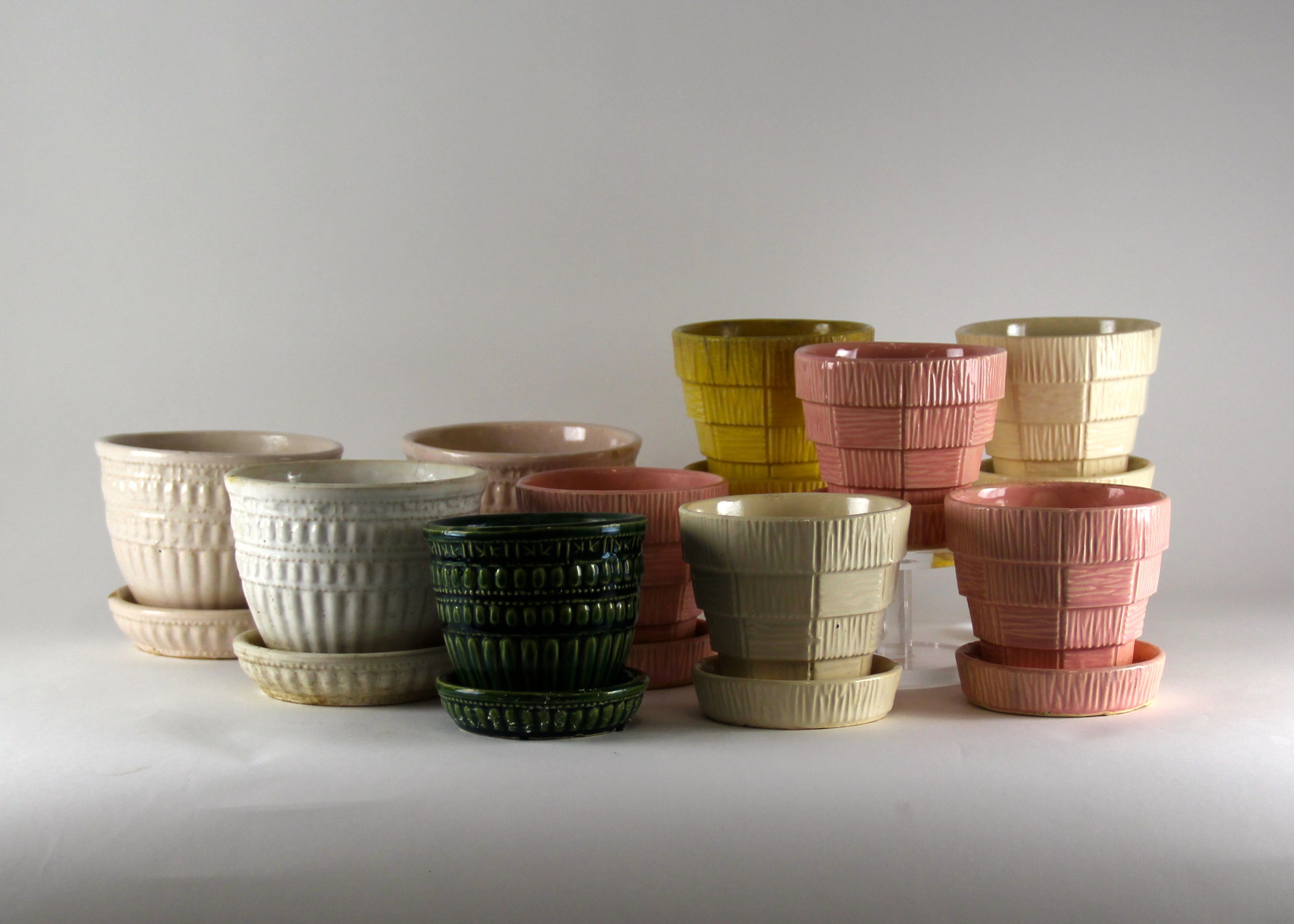 Collection of 10 Vintage Mid-Century McCoy Pottery Planters with Attached Saucer