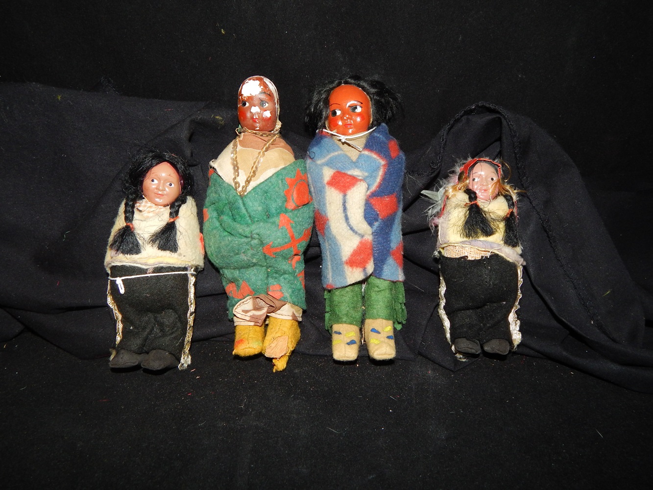 Four Native American Skookum Dolls 