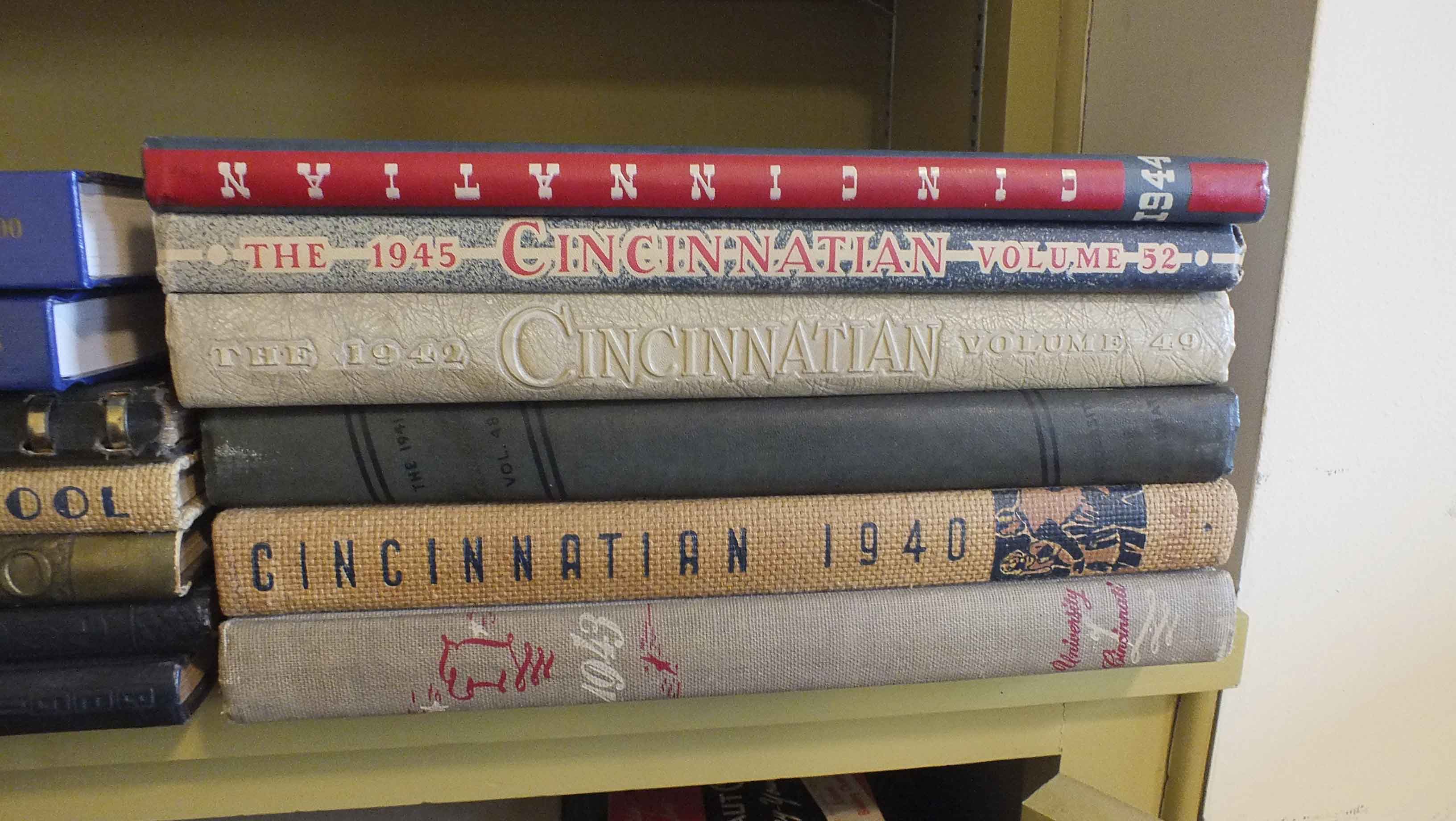 Stack of High School and College Yearbooks