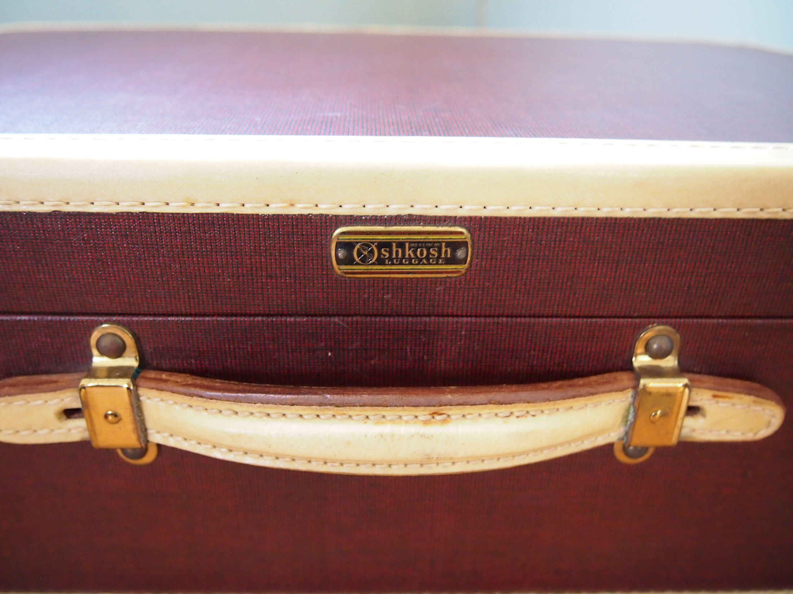 Two Vintage Maroon Oshkosh Luggage