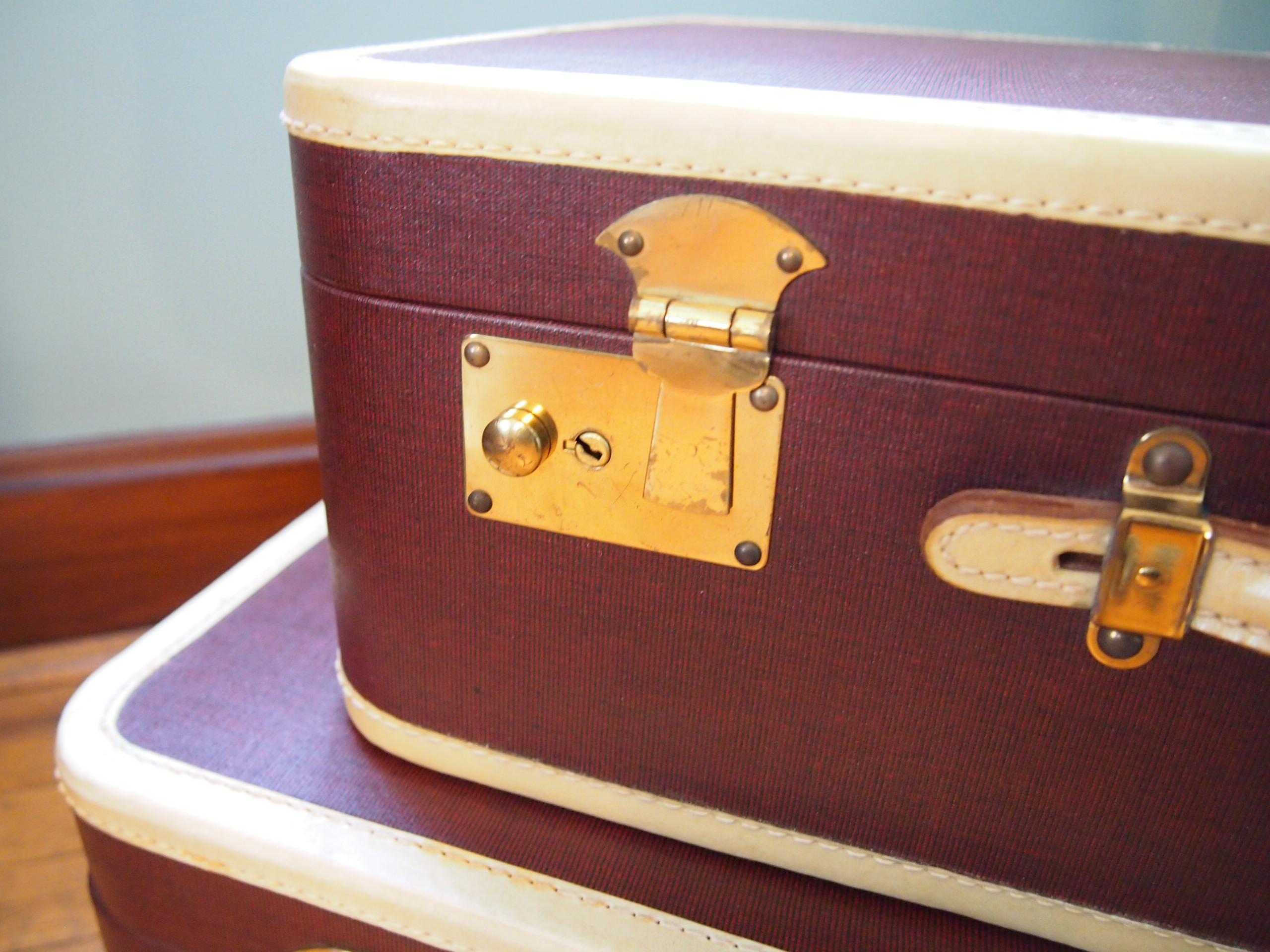 Two Vintage Maroon Oshkosh Luggage