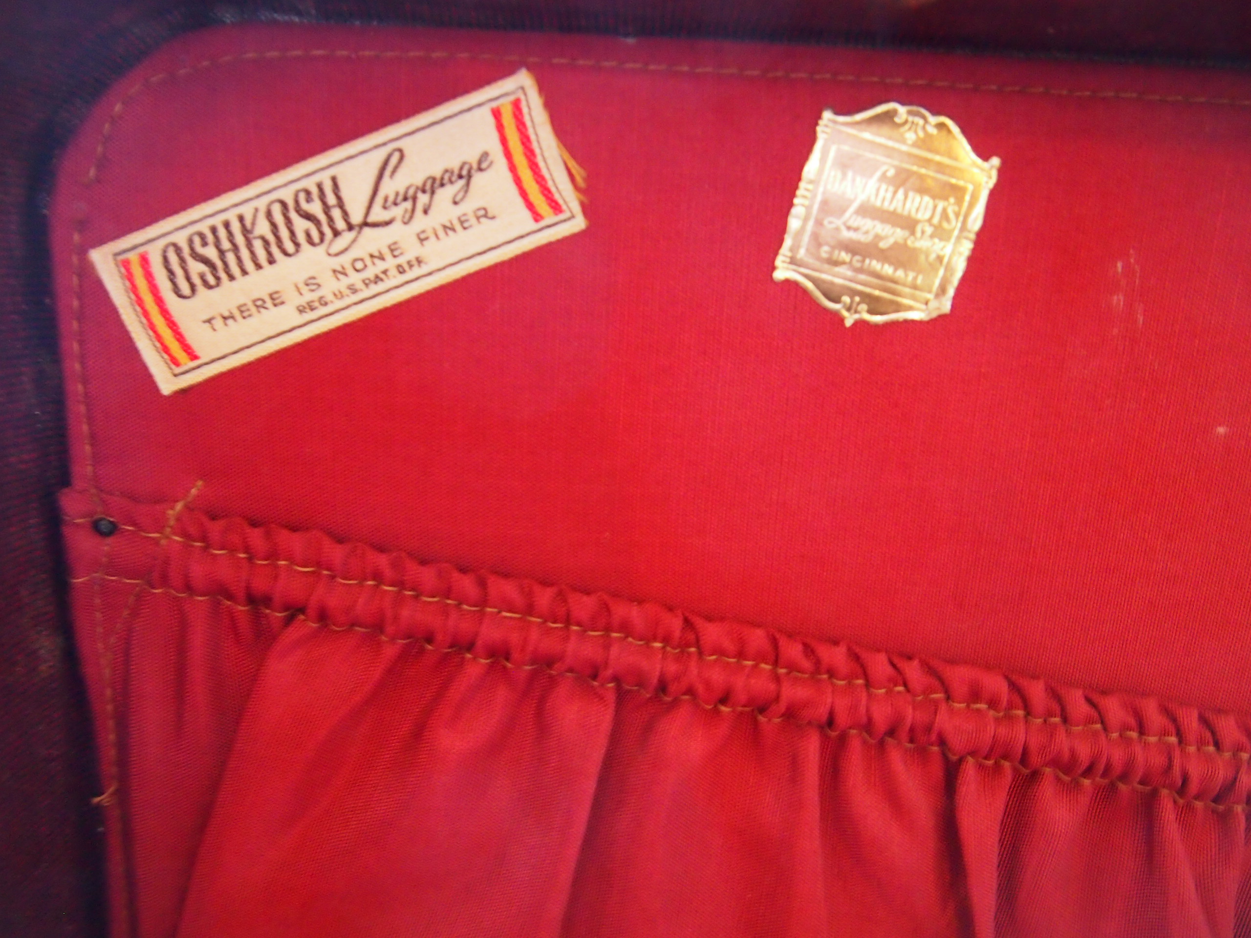 Two Vintage Maroon Oshkosh Luggage