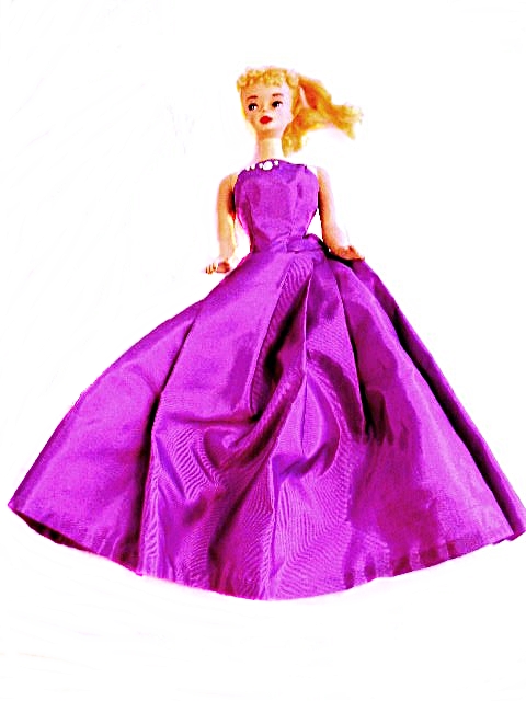 Patent Vinyl Barbie Case, Four Barbies and Assorted Clothing and Accessories