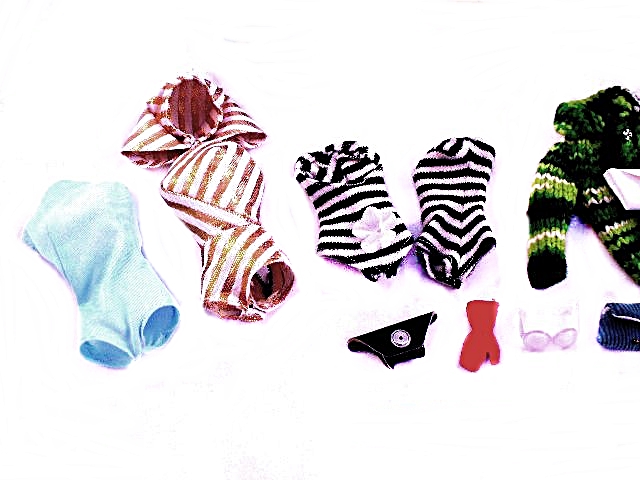 Patent Vinyl Barbie Case, Four Barbies and Assorted Clothing and Accessories