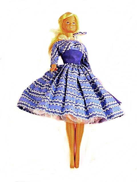 Patent Vinyl Barbie Case, Four Barbies and Assorted Clothing and Accessories