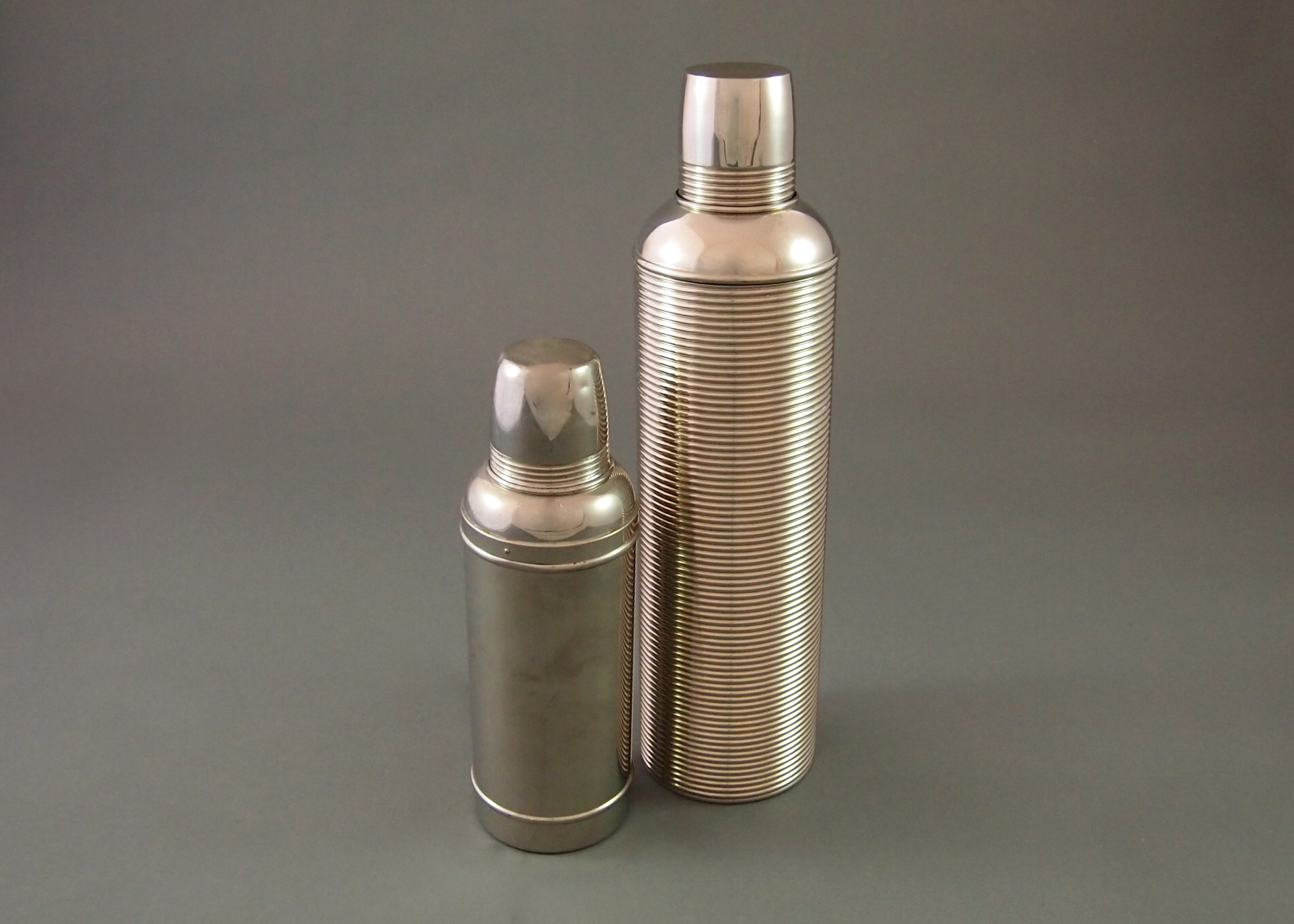 Silver Metal Thermos and Icy-Hot Vessel