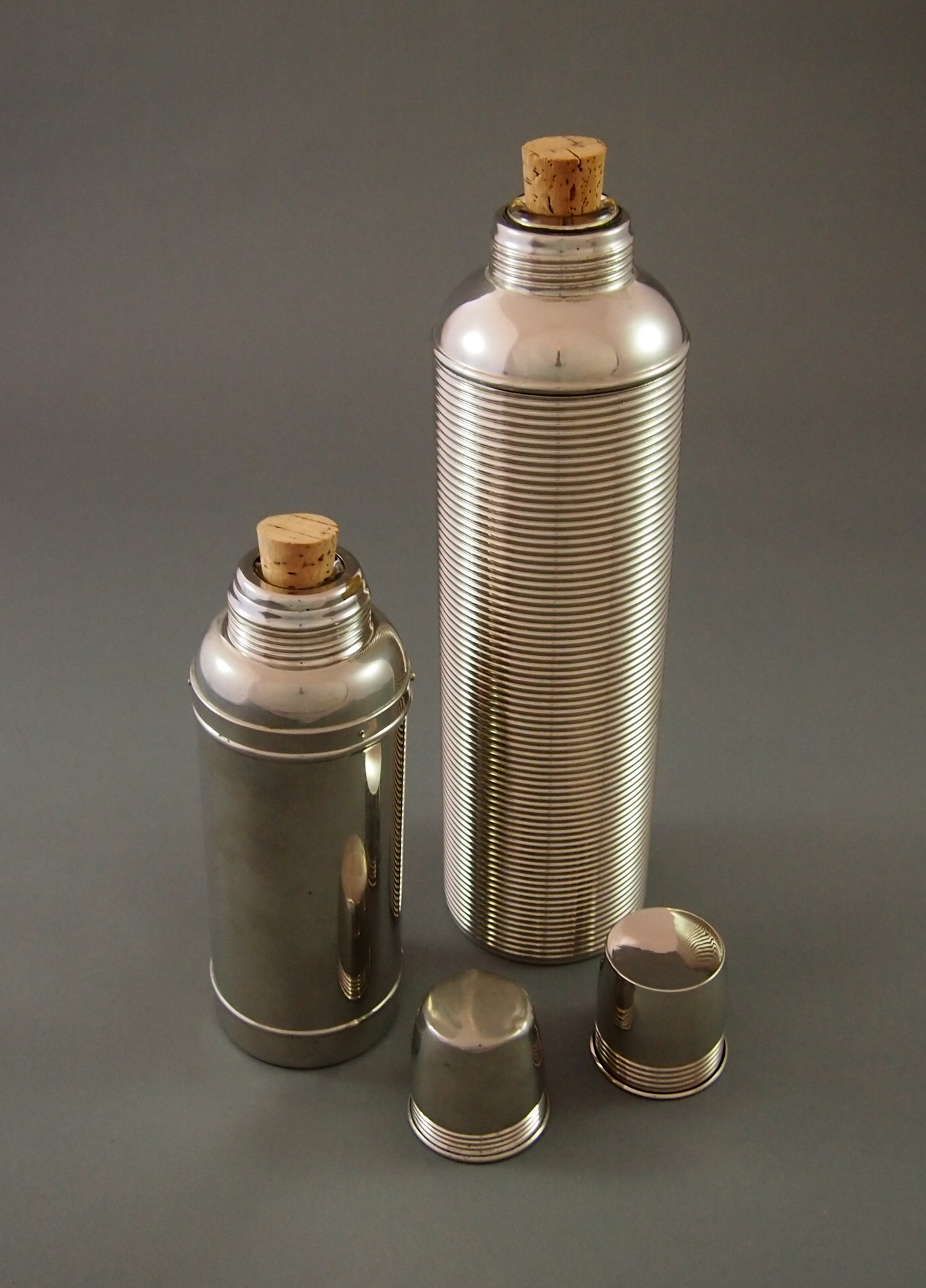Silver Metal Thermos and Icy-Hot Vessel