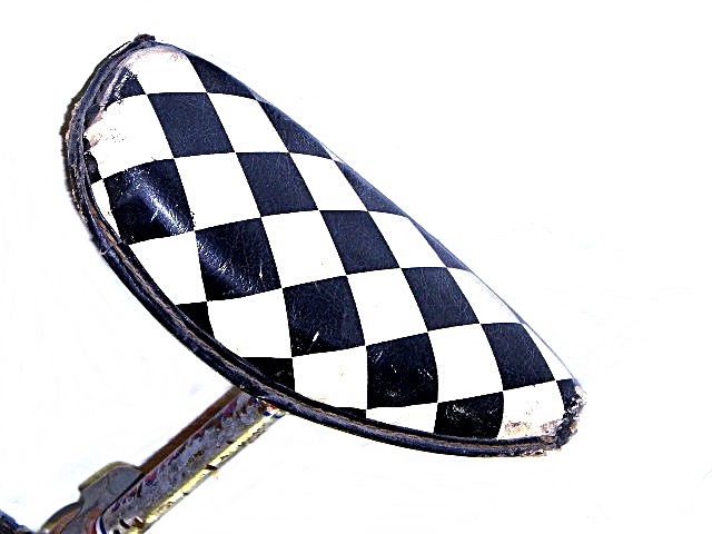 A Vintage Unicycle with a Jaunty Checkerboard Seat