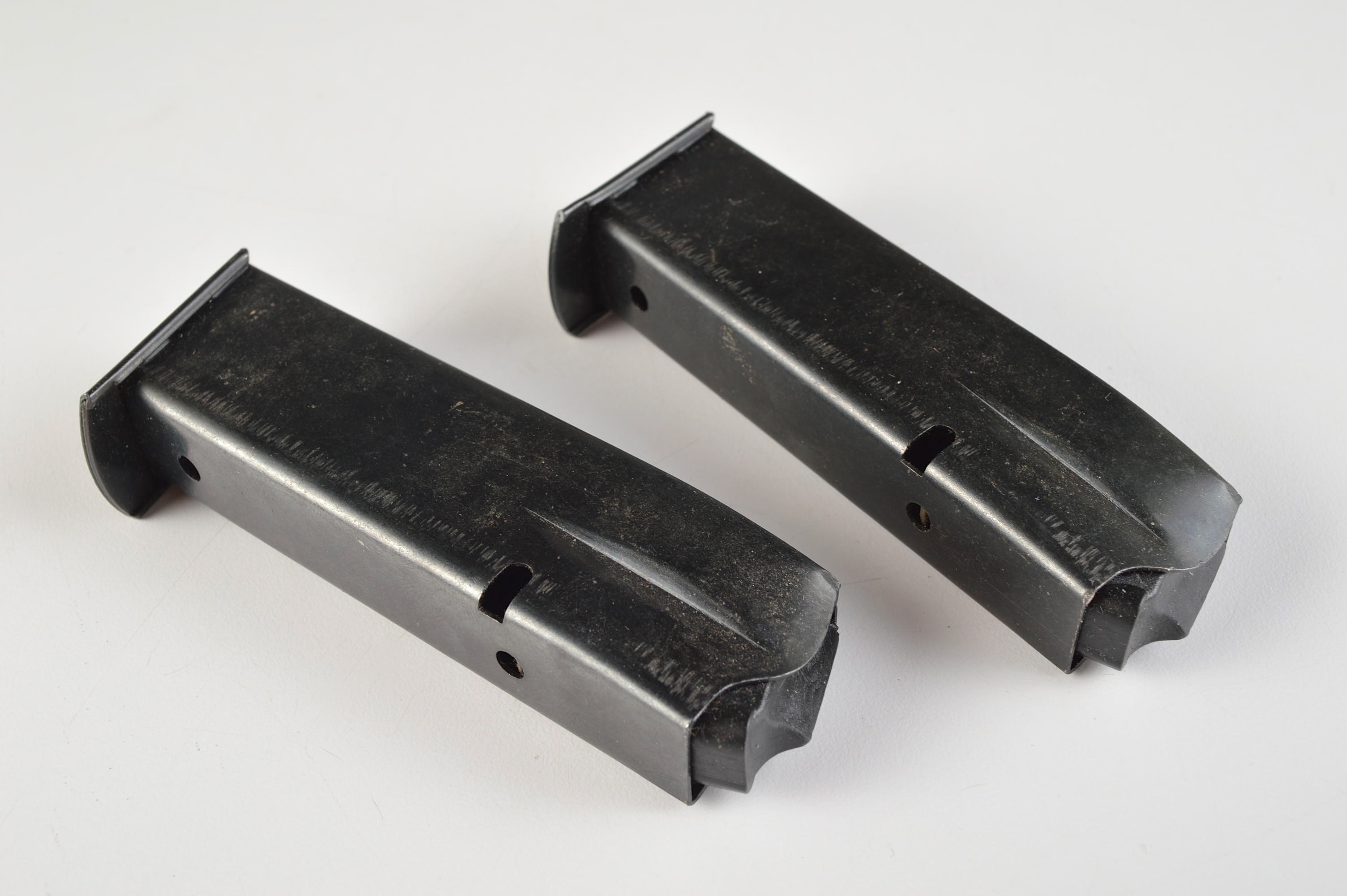 A Group of Two Magazine Clips for an Unknown Pistol