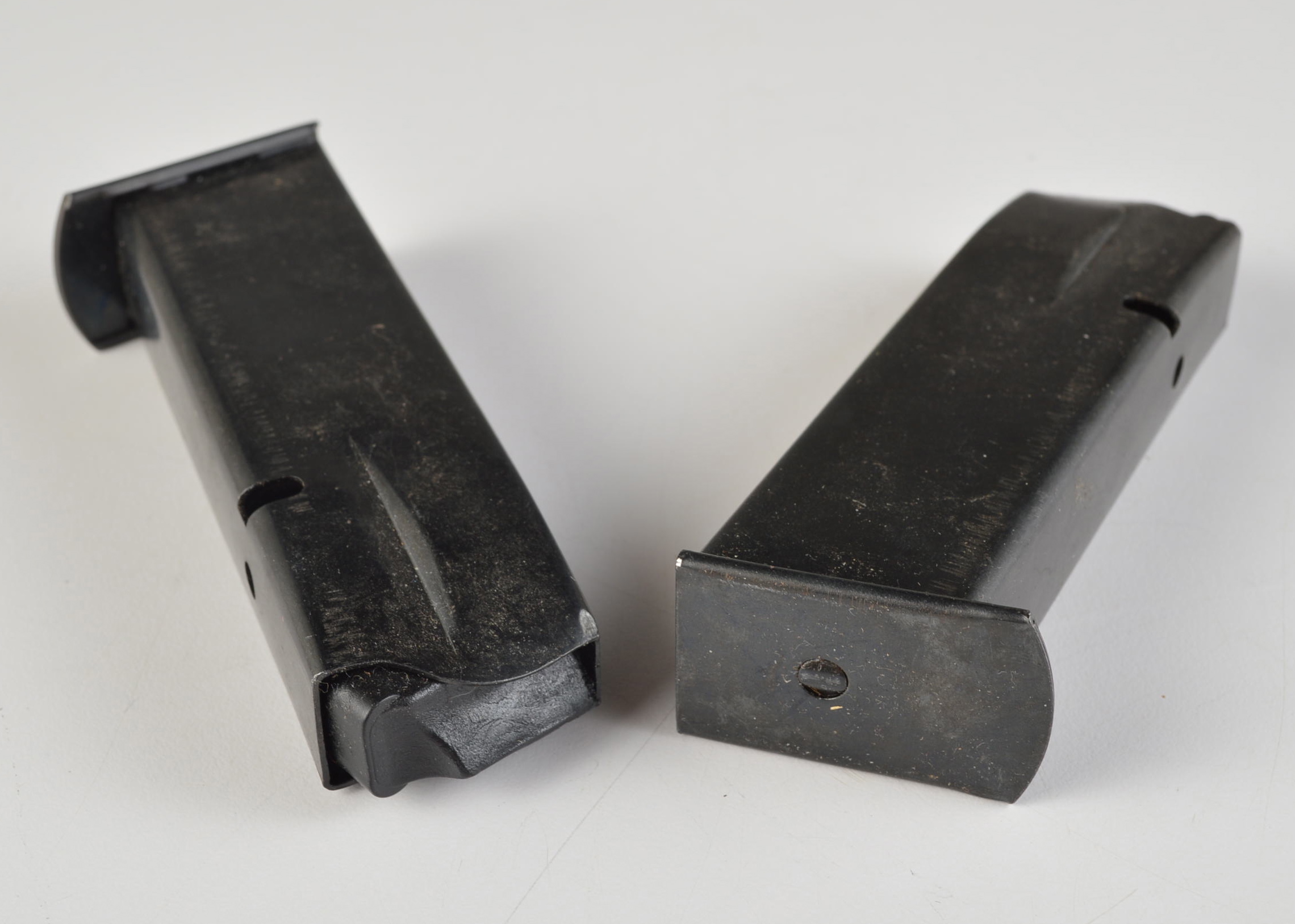 A Group of Two Magazine Clips for an Unknown Pistol