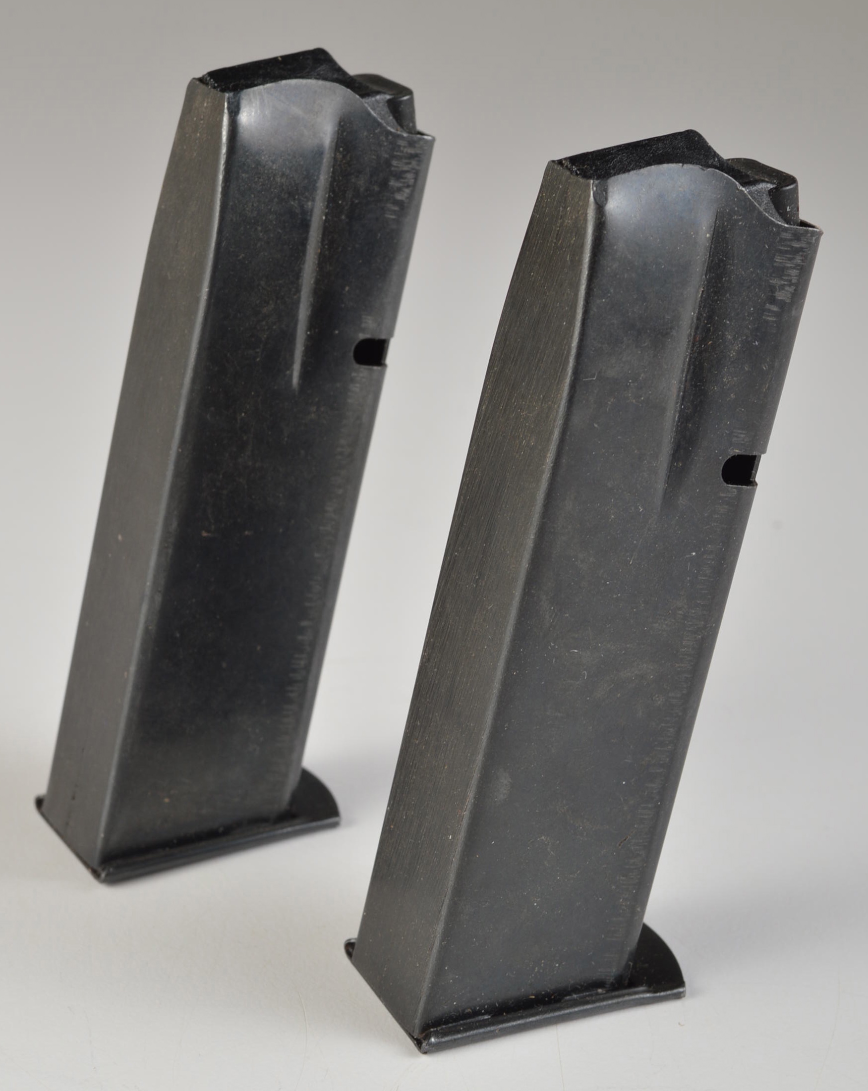 A Group of Two Magazine Clips for an Unknown Pistol