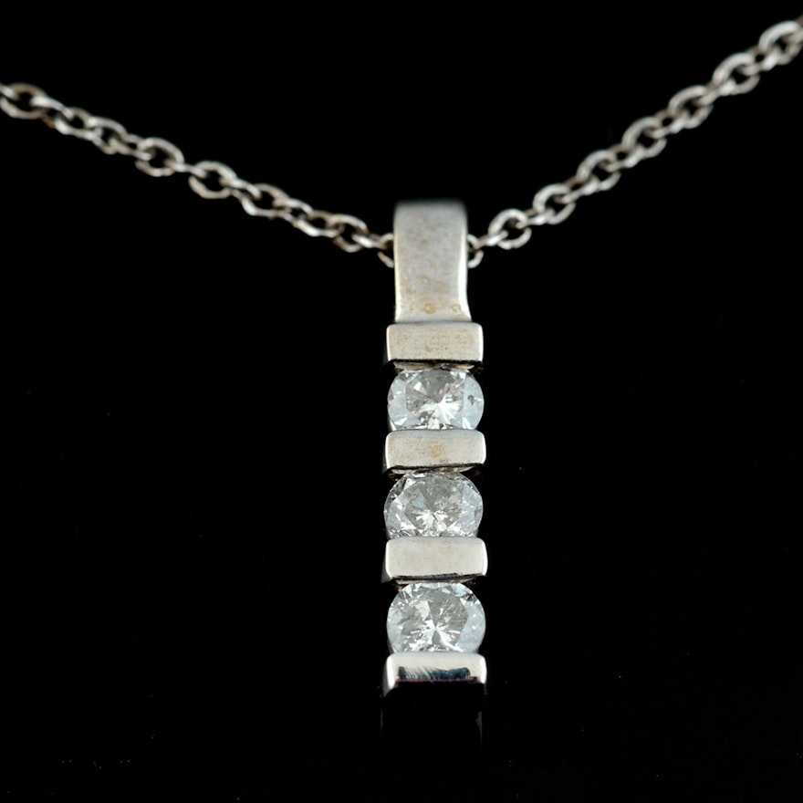 14 K White Gold Diamond Pendant with a Sterling Silver 18" Chain