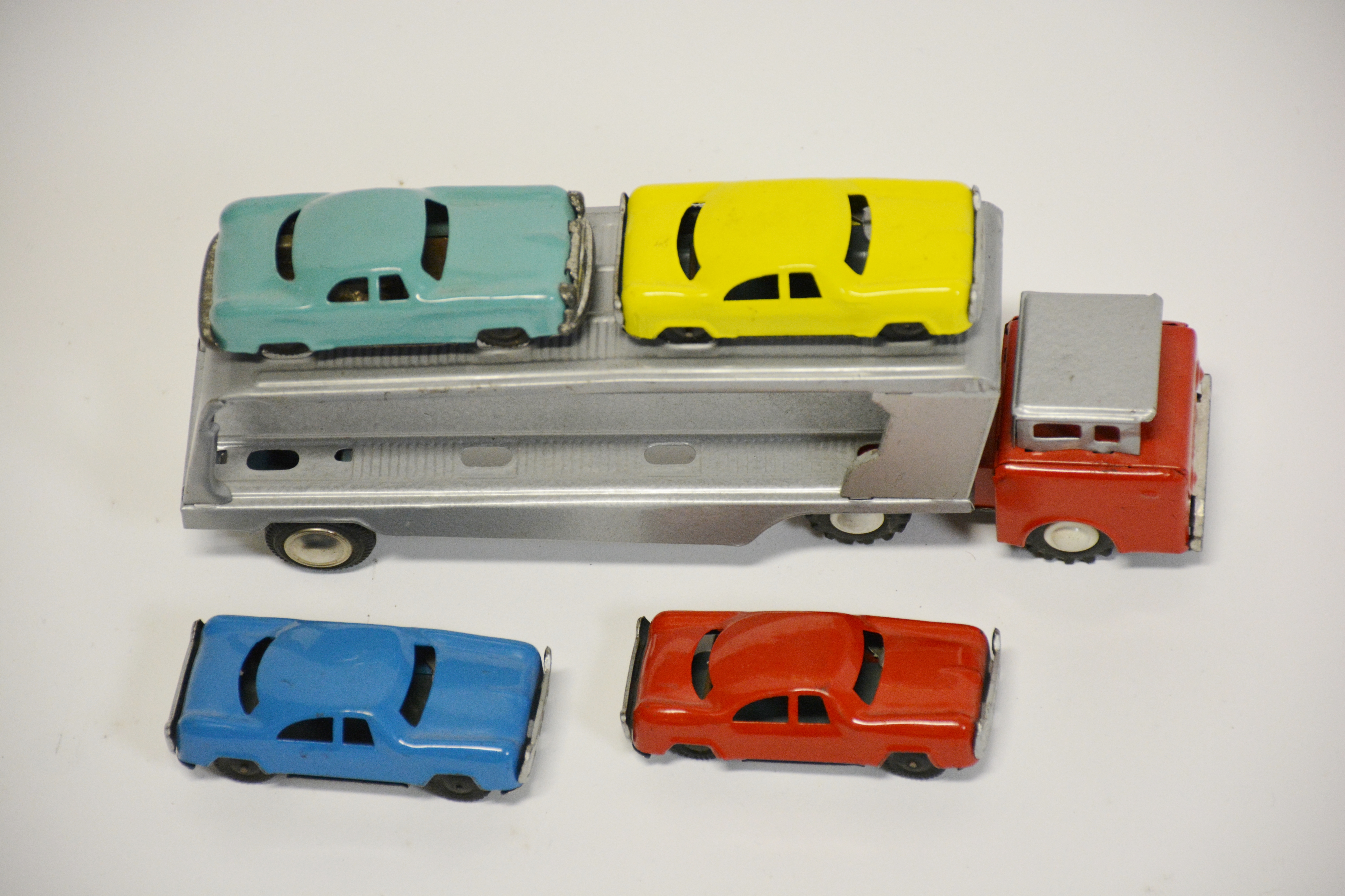 Vintage Japanese Car Carrier with Four Tin Cars  