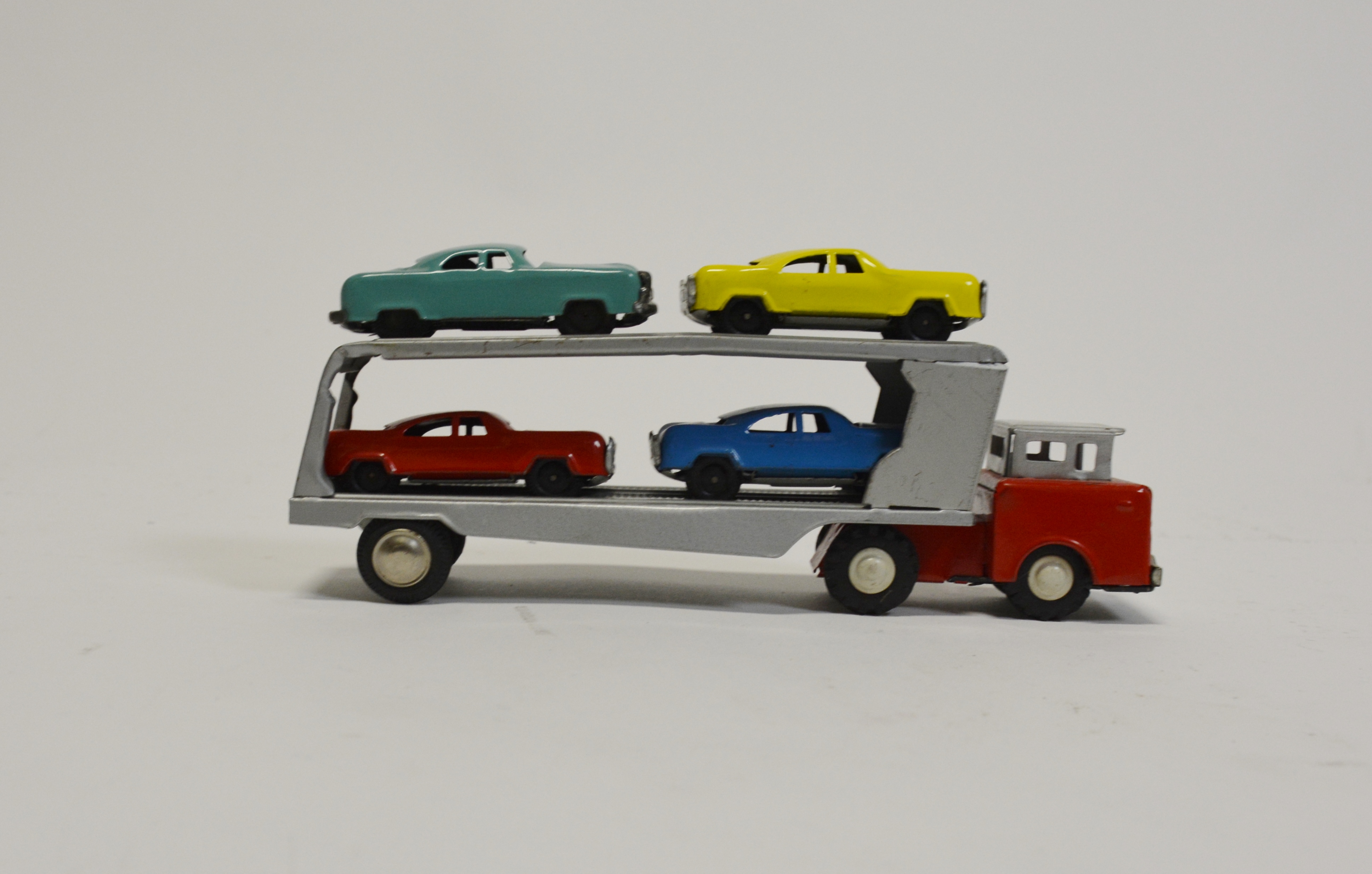 Vintage Japanese Car Carrier with Four Tin Cars  
