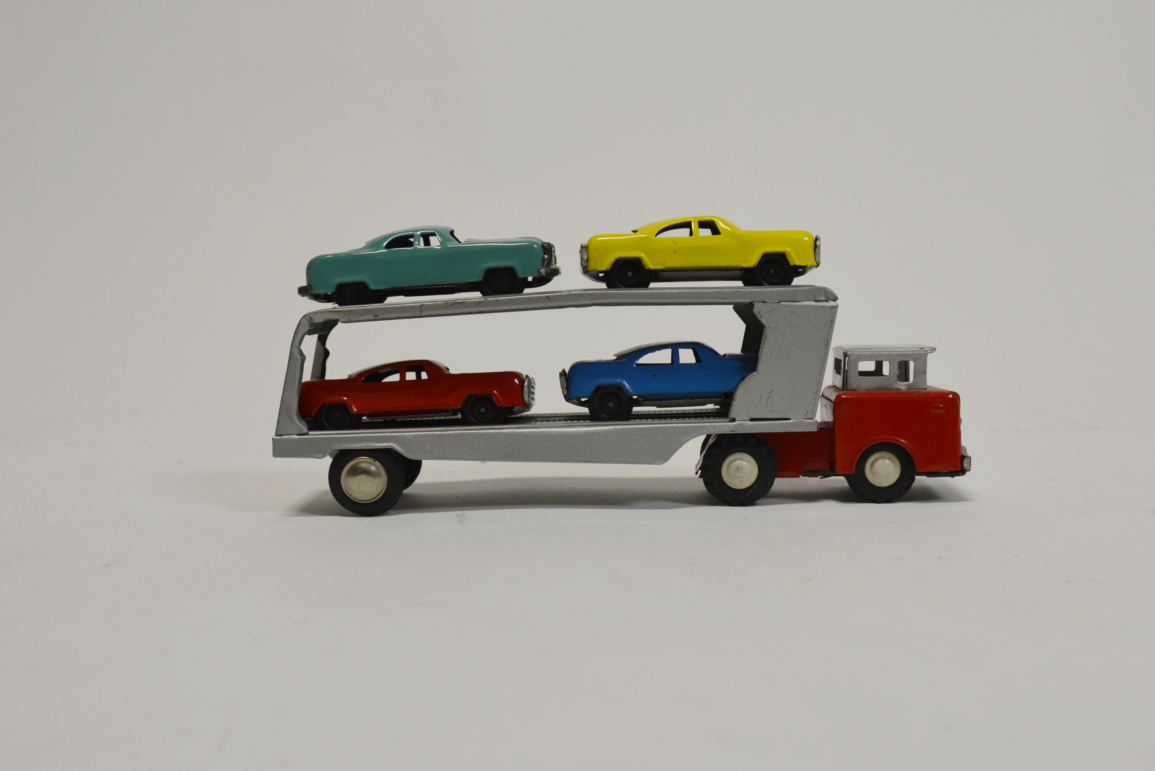 Vintage Japanese Car Carrier with Four Tin Cars  