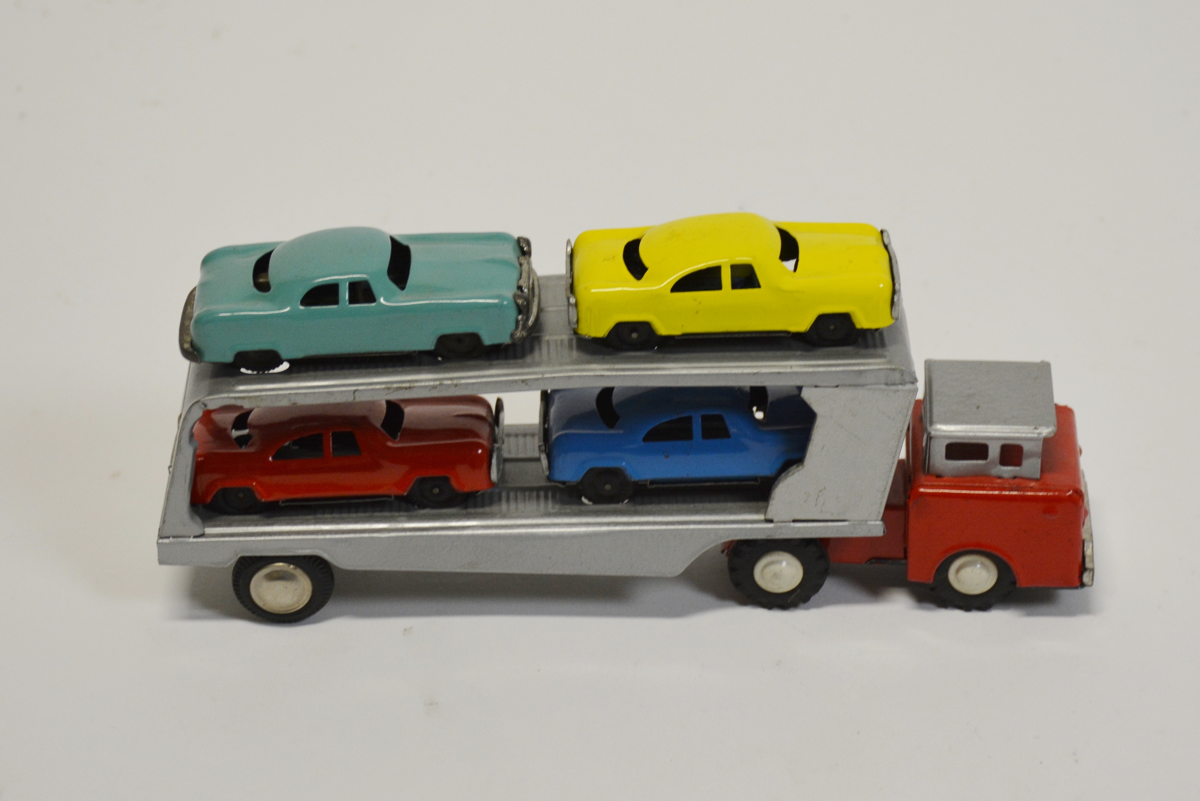 Vintage Japanese Car Carrier with Four Tin Cars  