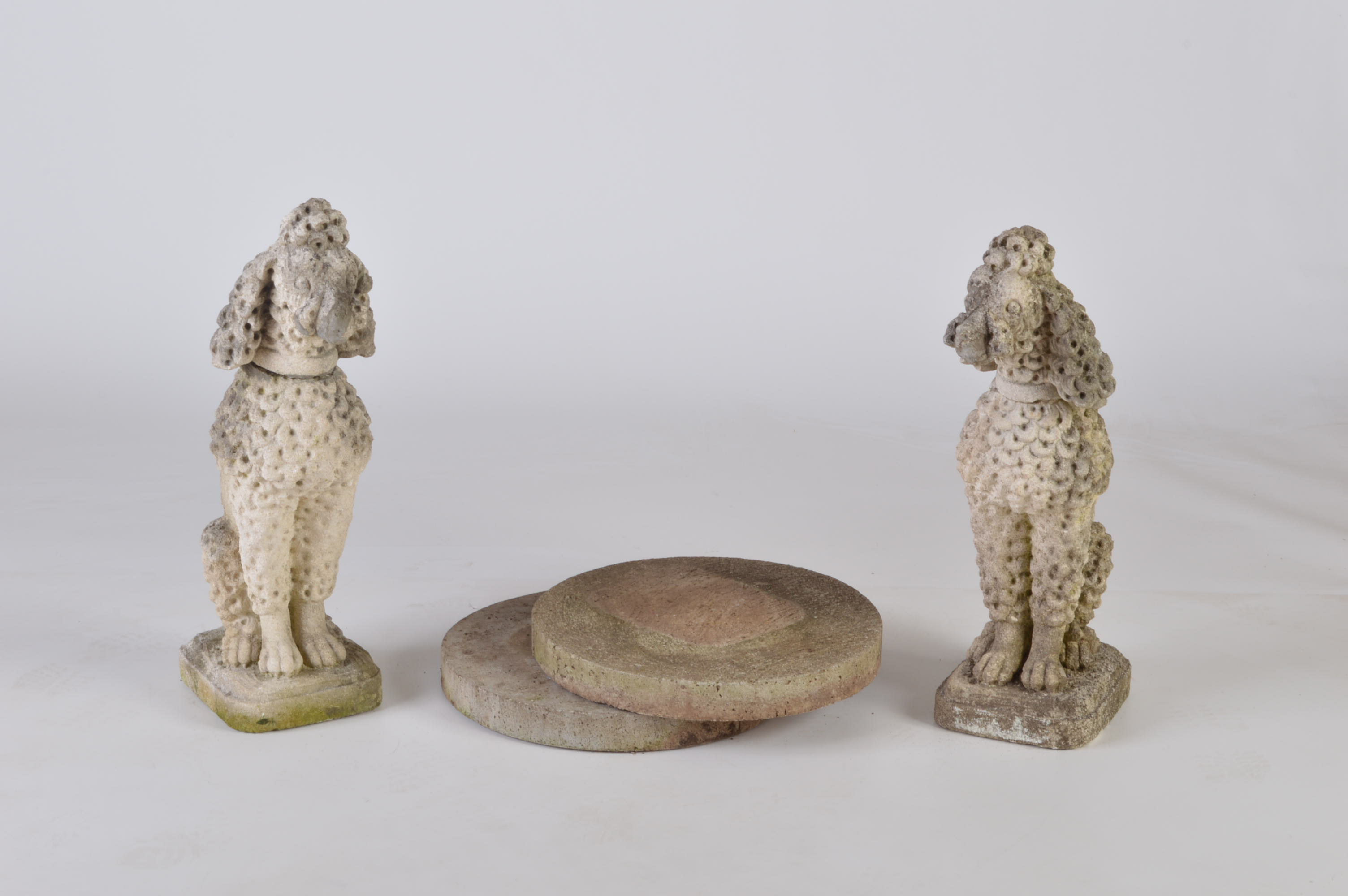 Pair of Vintage Cement Poodles with Round Plinths 