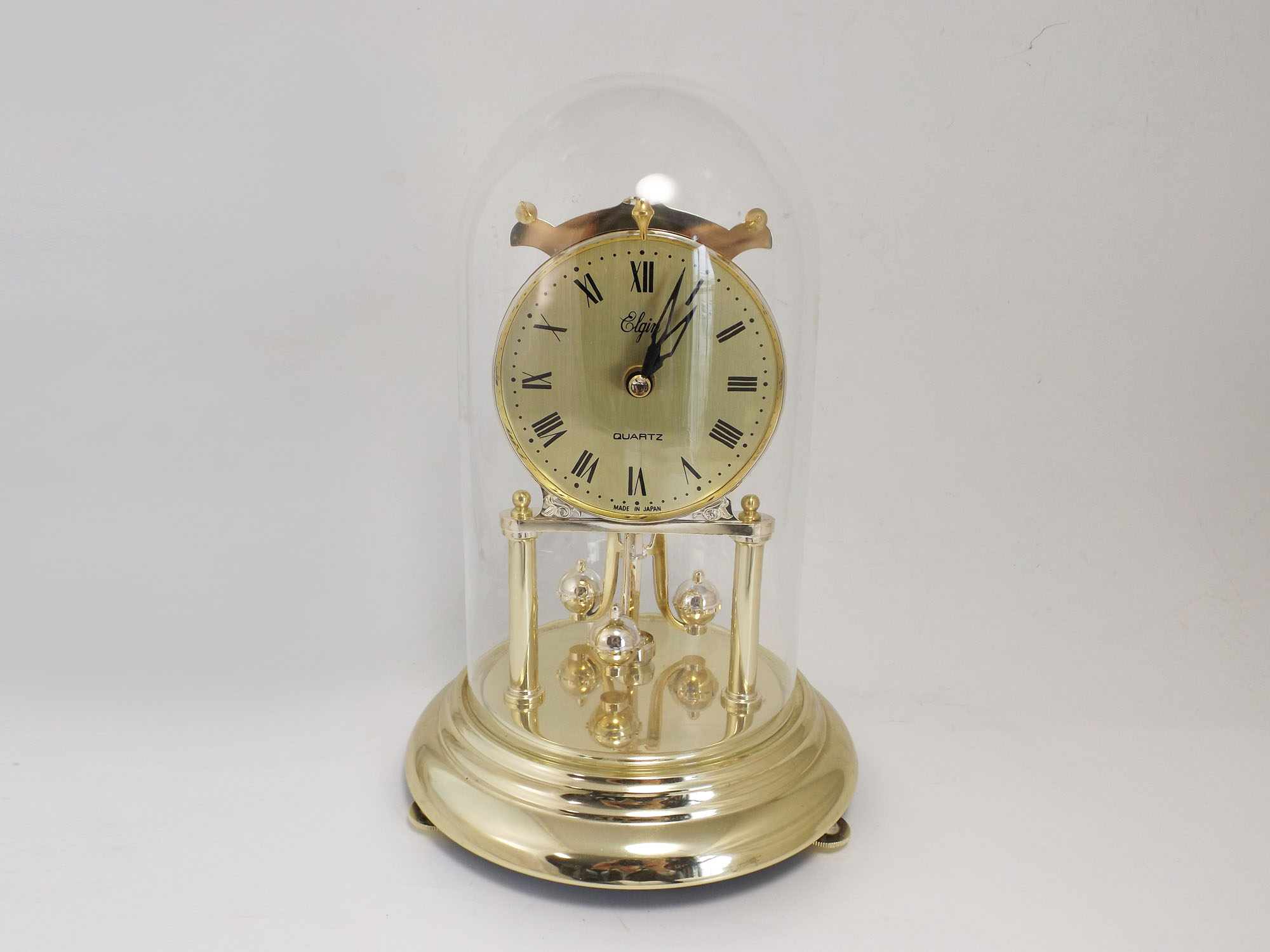 Elgin Anniversary Clock under a Glass Dome