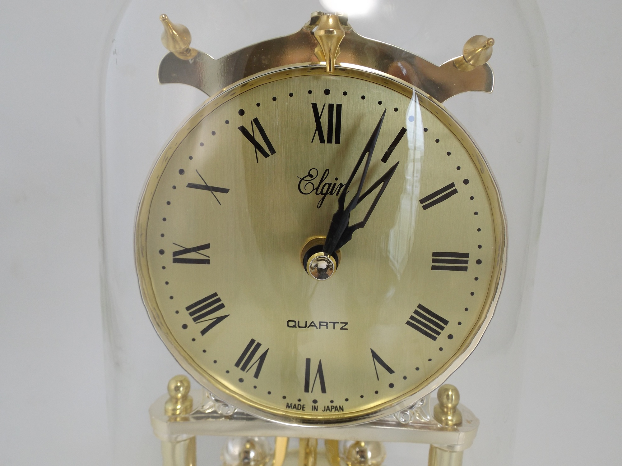 Elgin Anniversary Clock under a Glass Dome