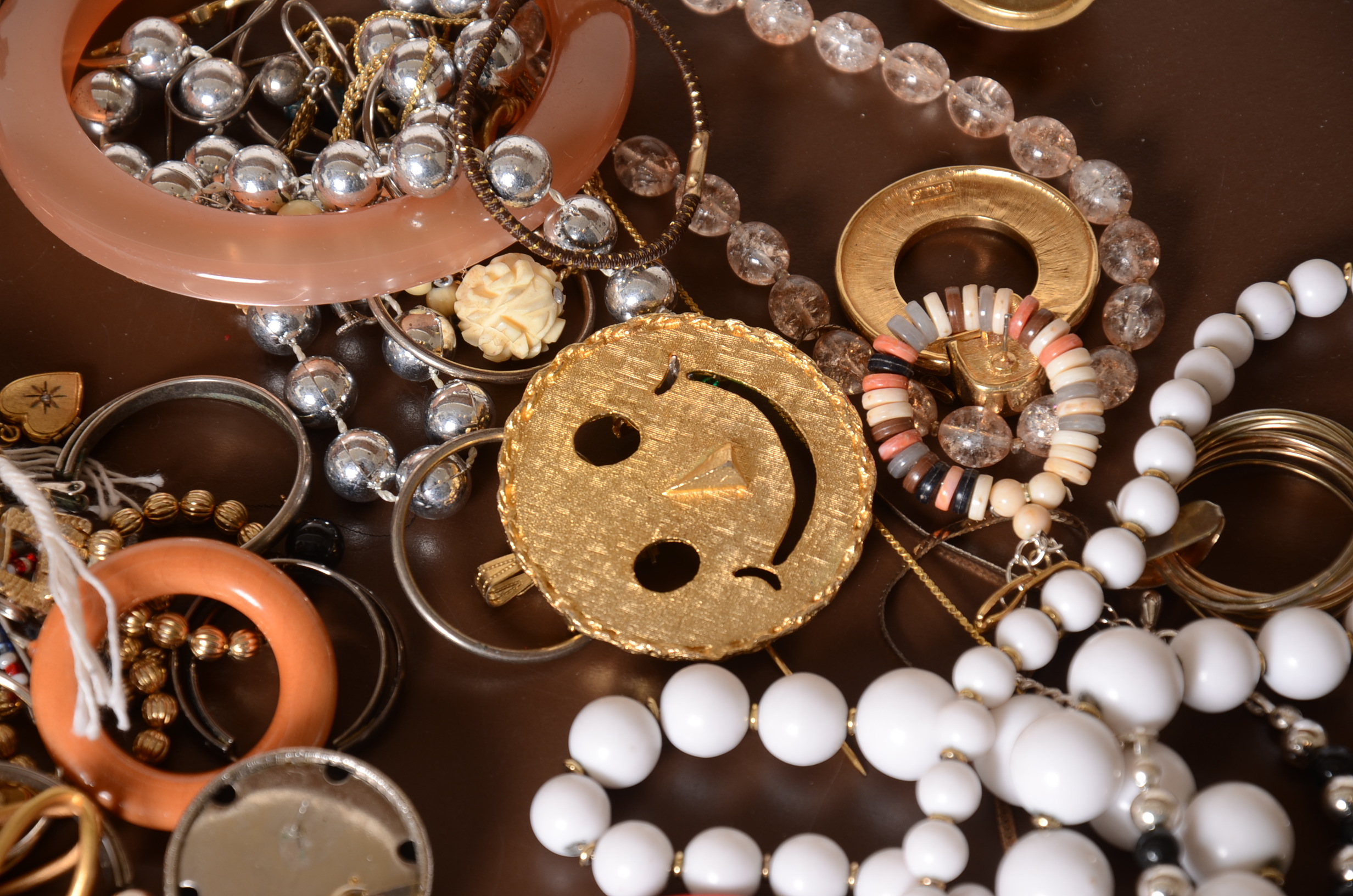 Tin of Assorted Costume Jewelry