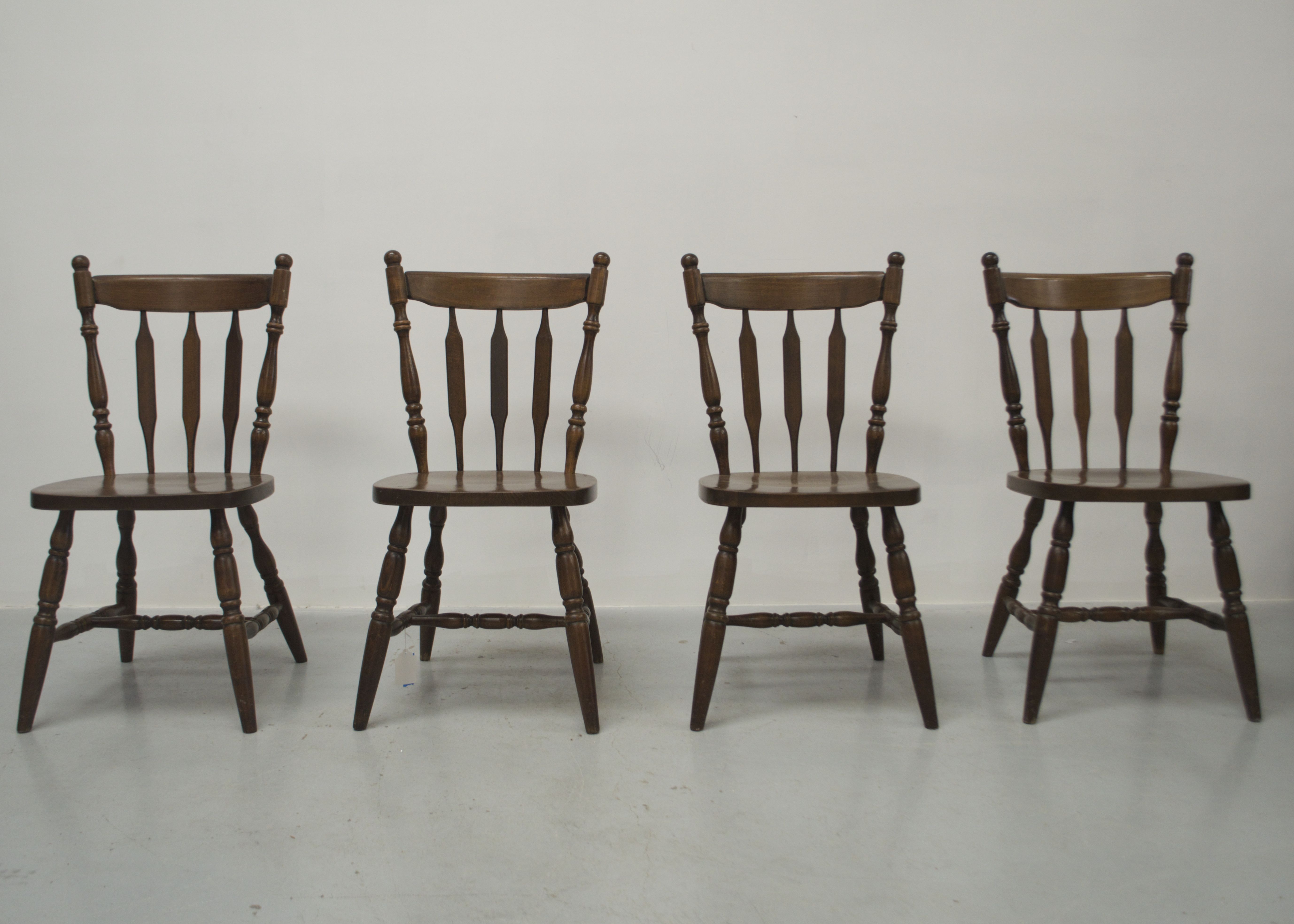 A Set Of Four Vintage Chairs