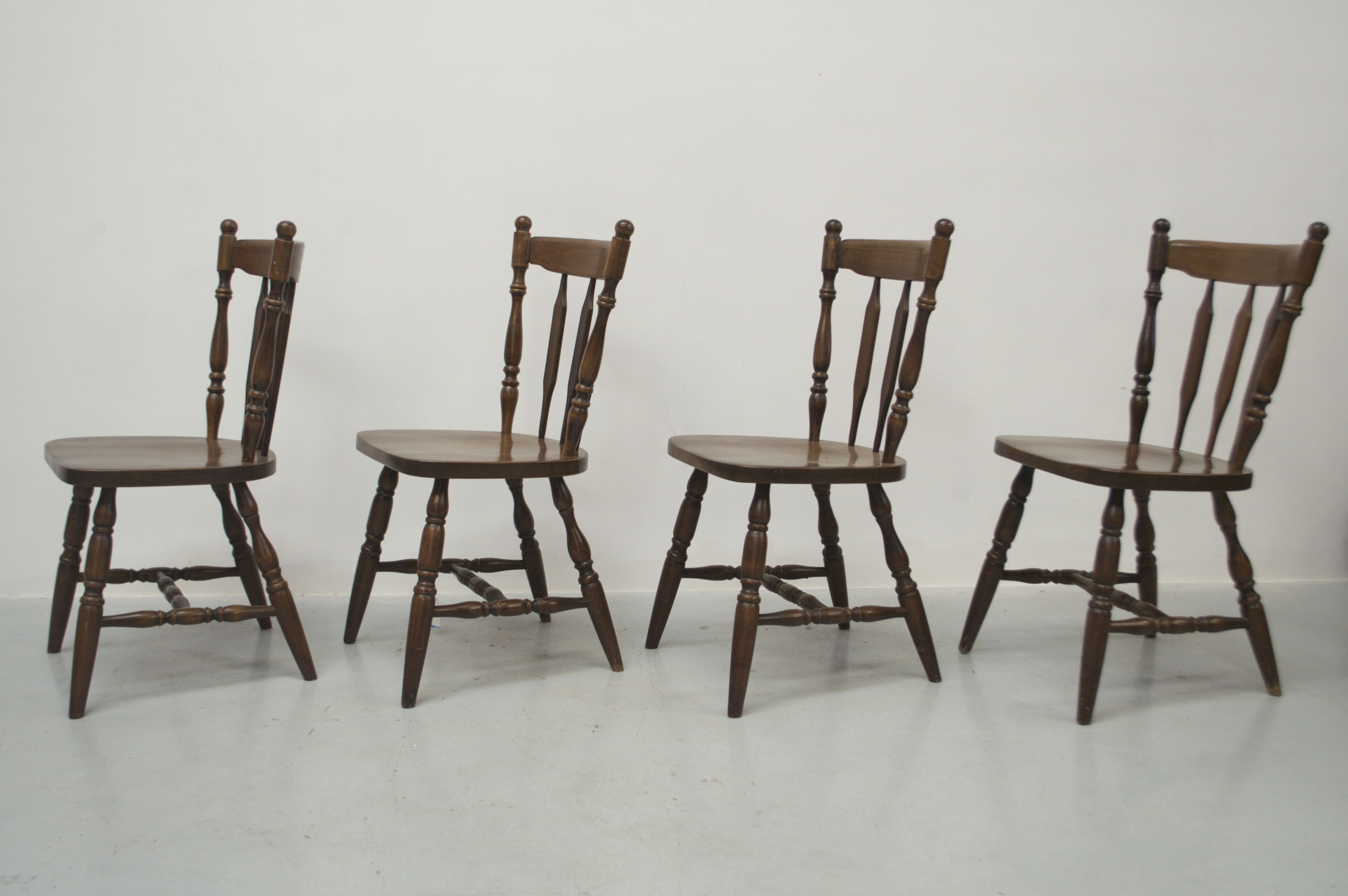 A Set Of Four Vintage Chairs