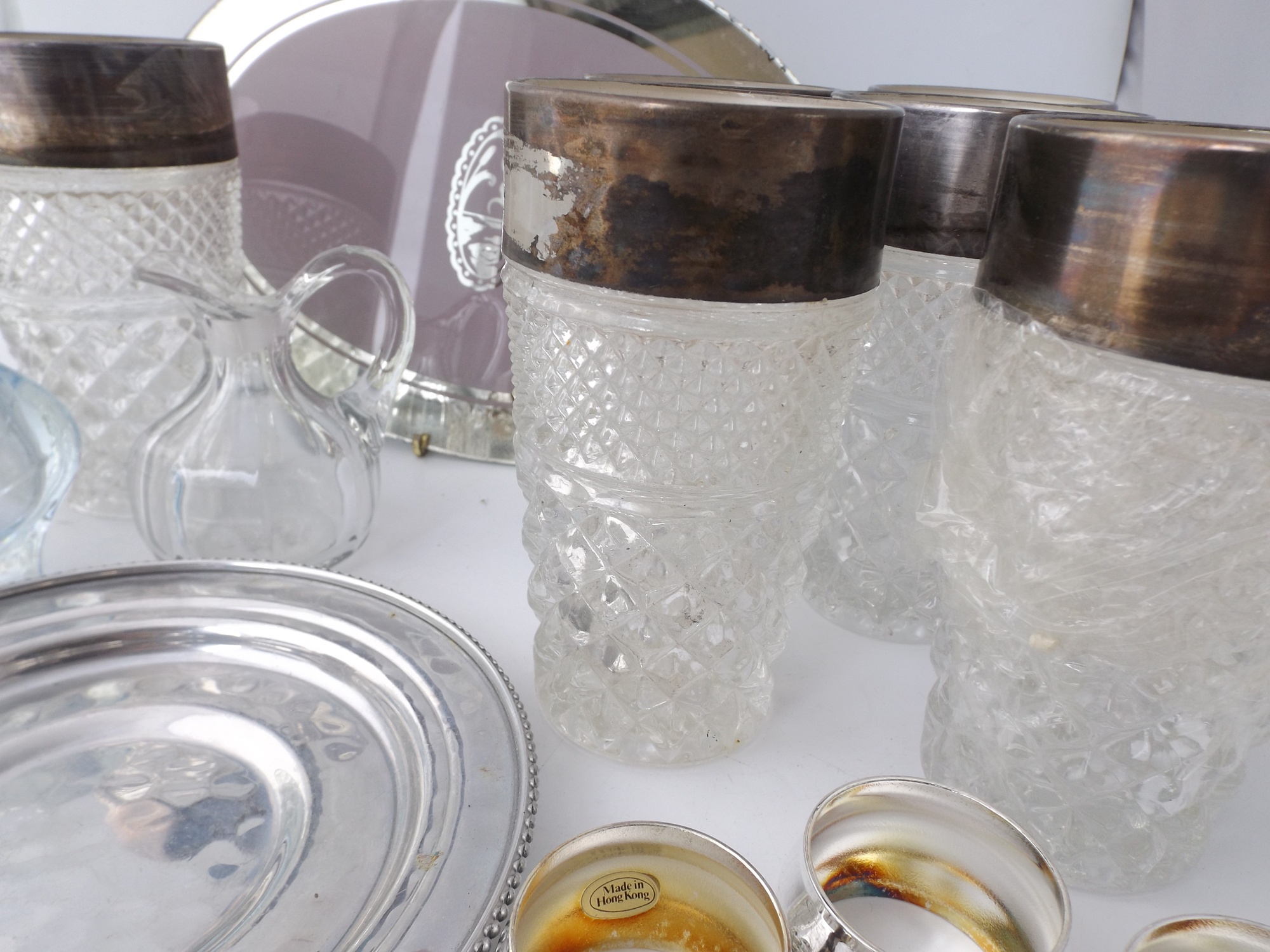A Group of Vintage Pressed Glassware with Silverplate Details