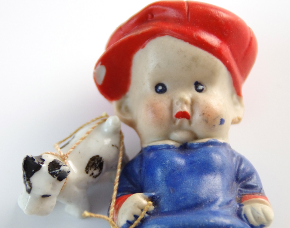 Decorative Group with Vintage Magazine and Figurines