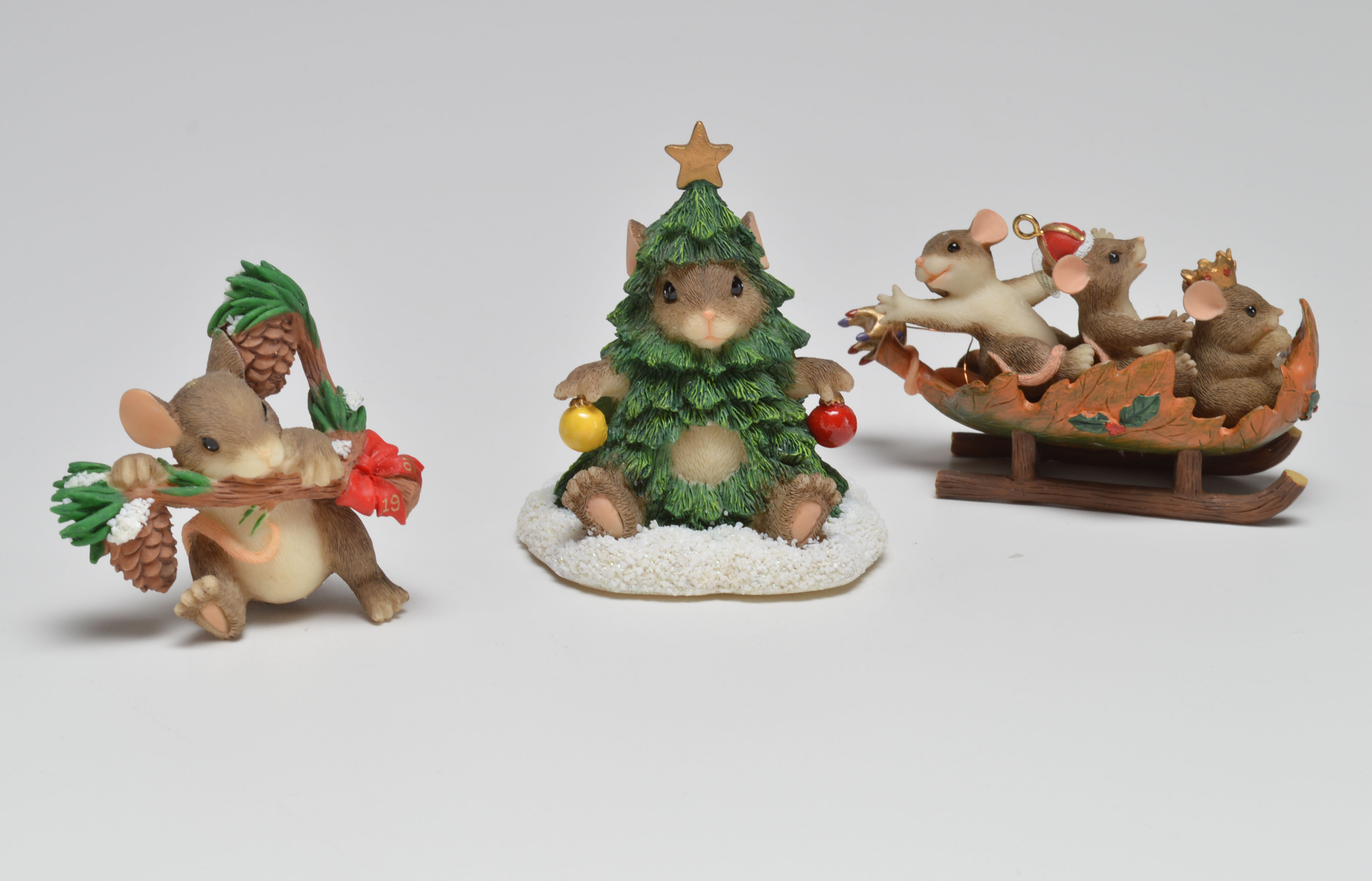 Collection of Nine "Charming Tails" Resin Figurines