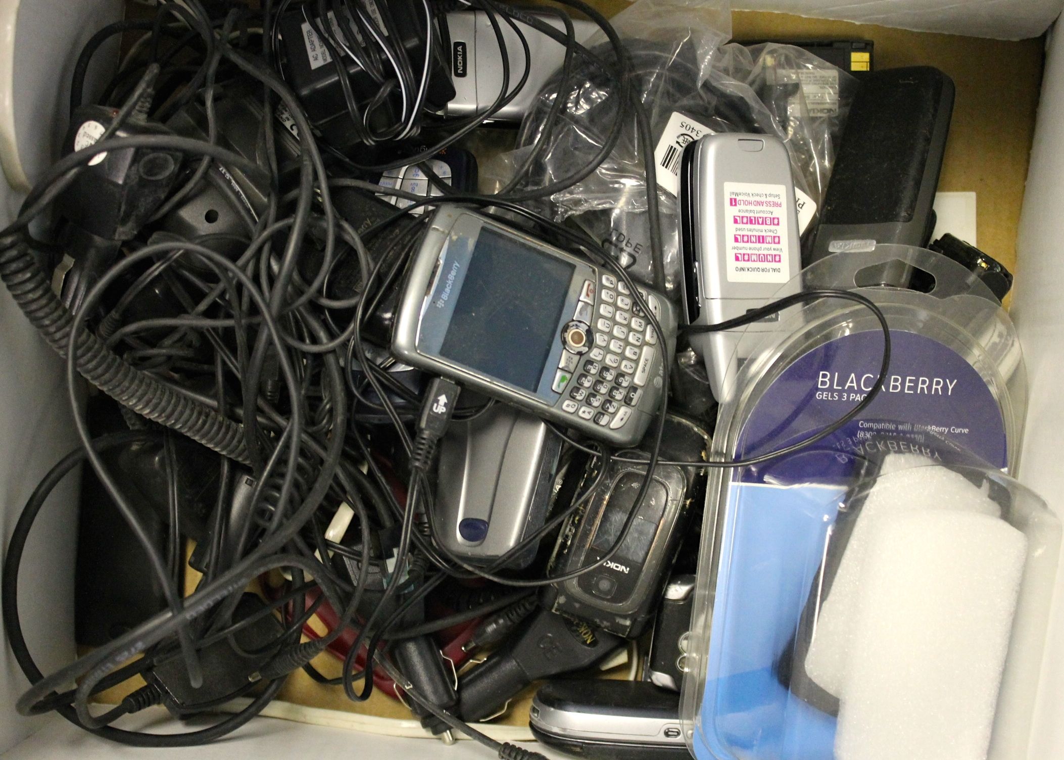 Lot of Cell Phones and Chargers