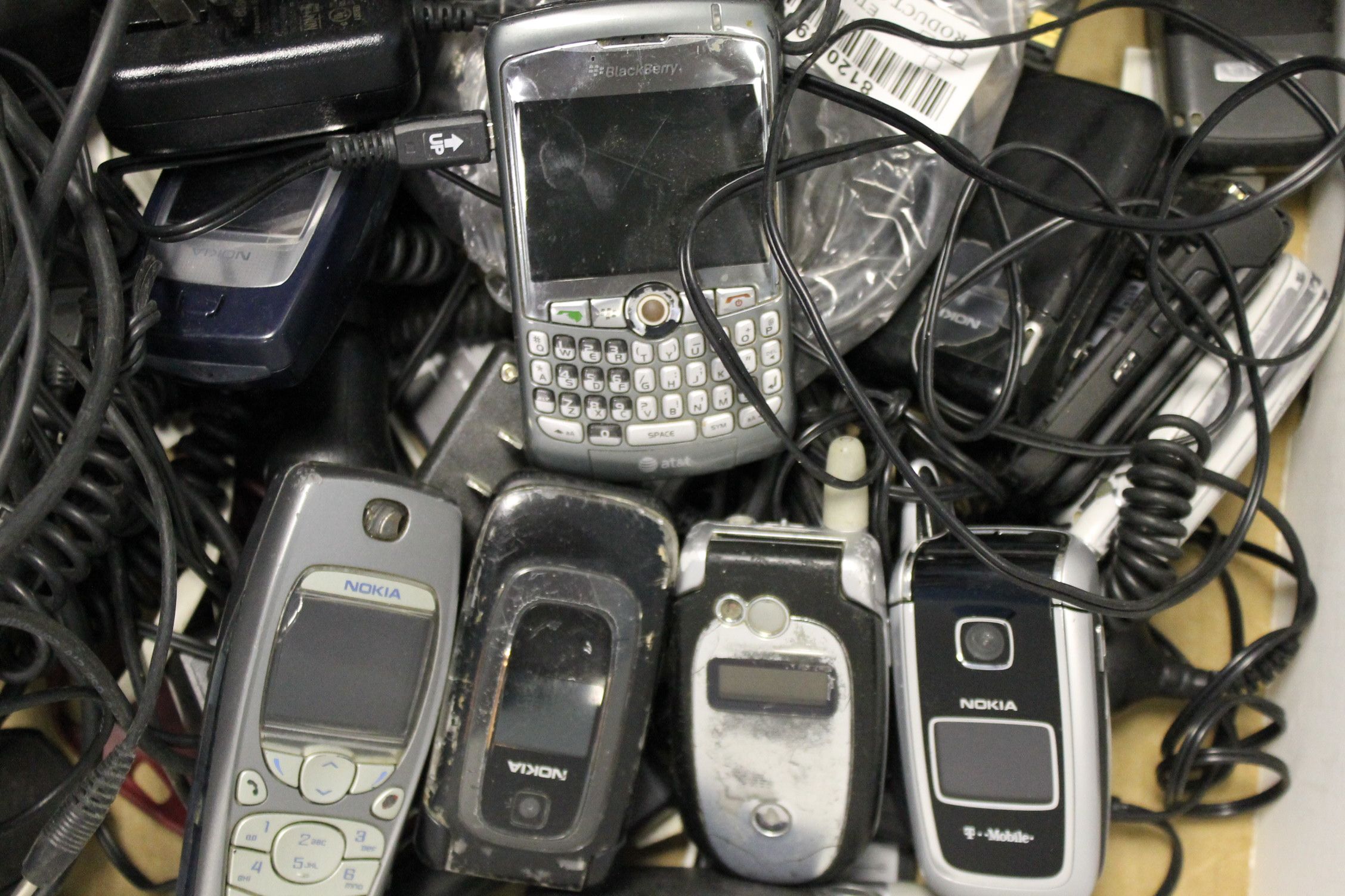 Lot of Cell Phones and Chargers