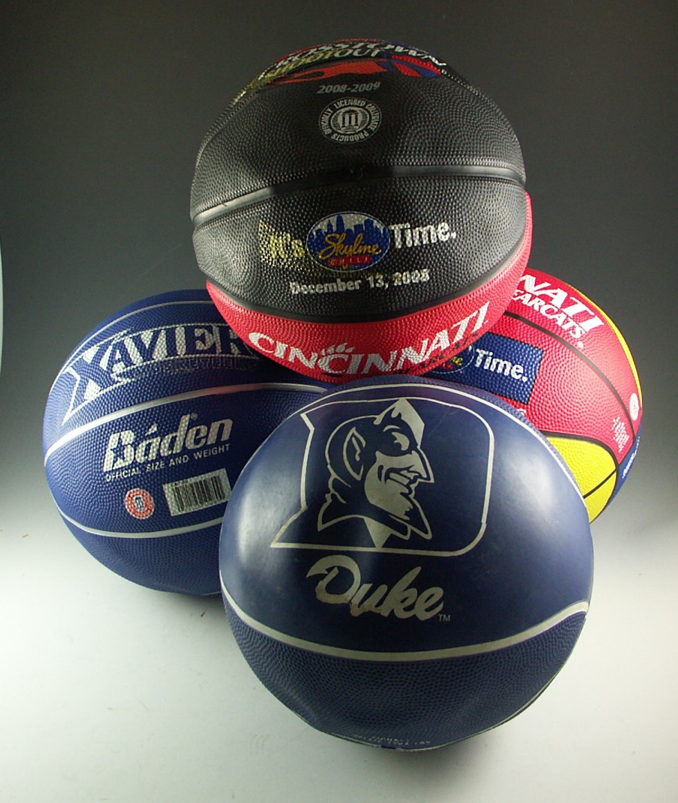Four Collegiate Basketballs