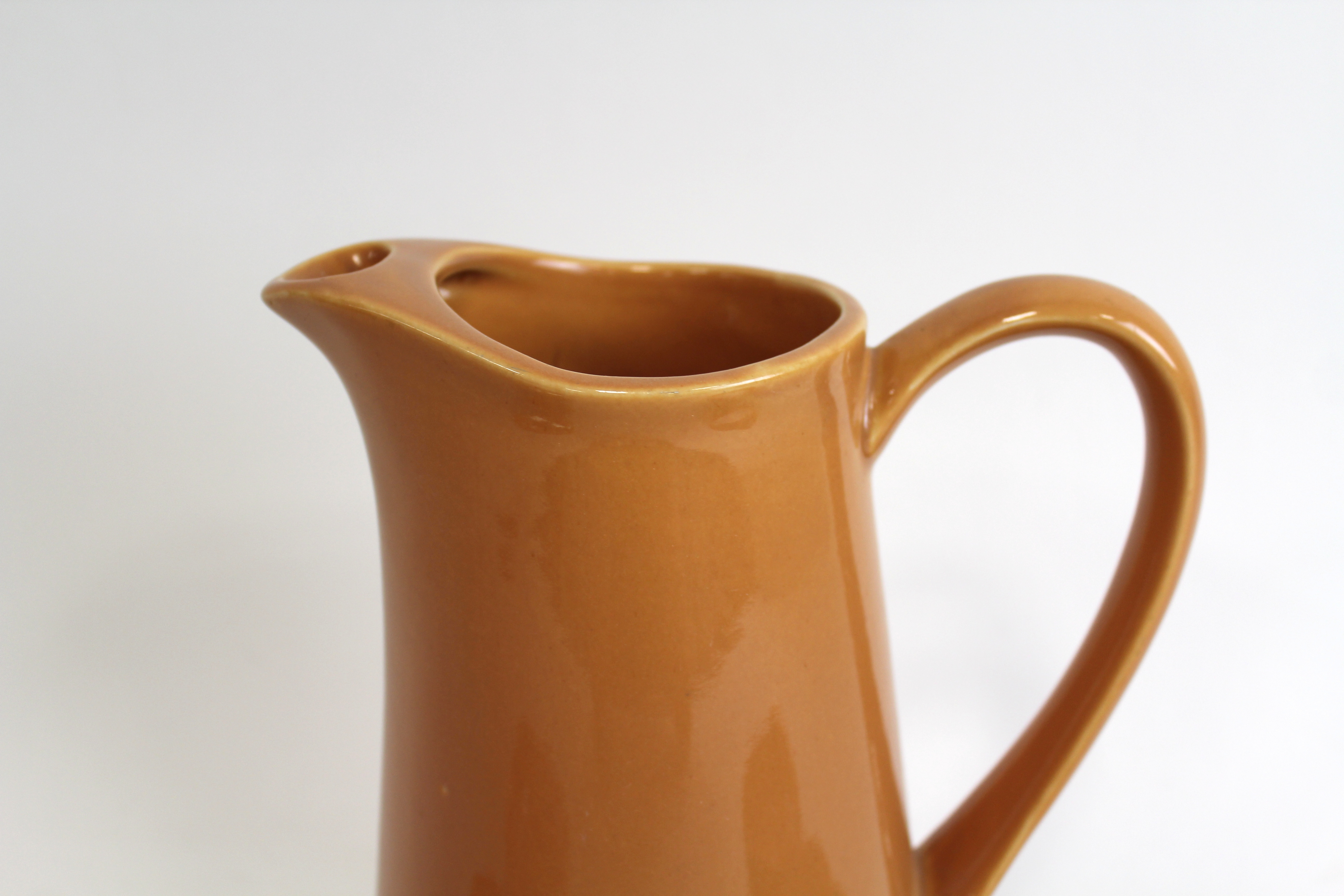 Orange Pitcher and Dishes