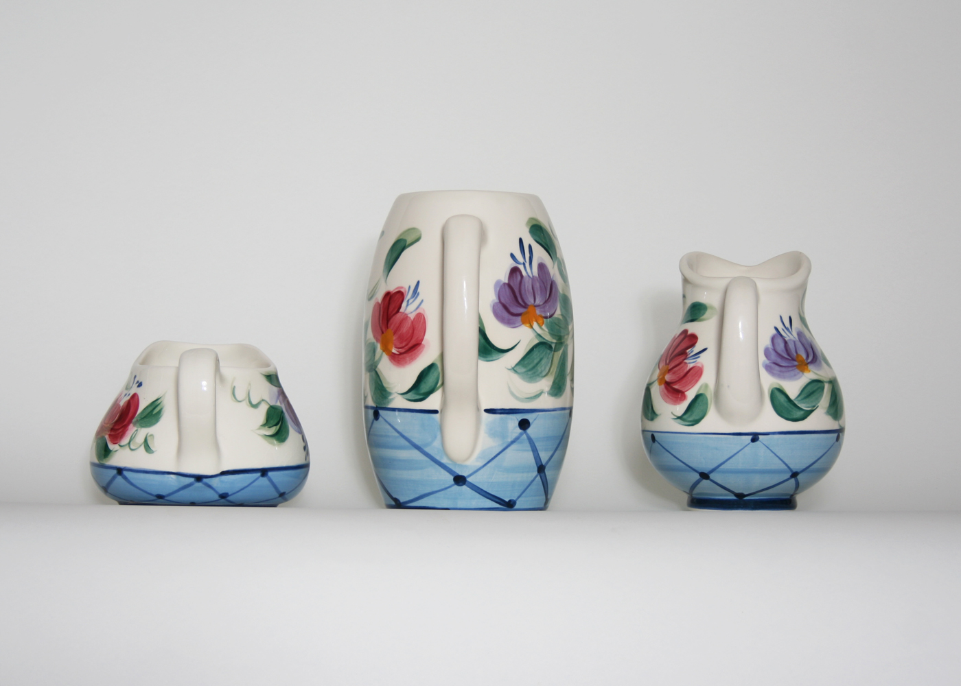 Set of Three Gail Pittman Ceramic Pitchers