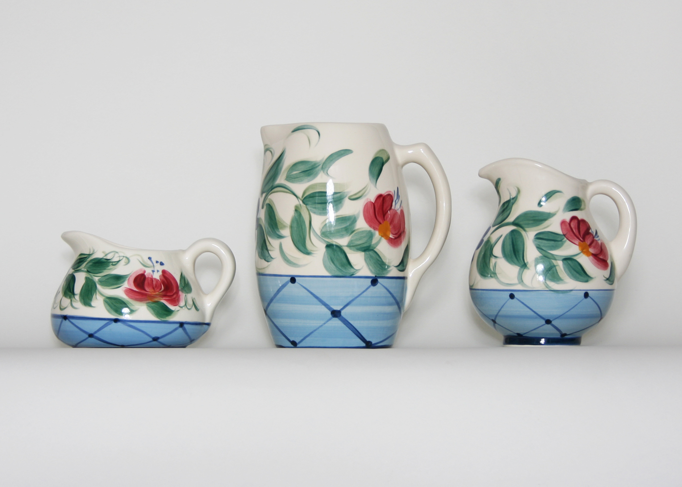 Set of Three Gail Pittman Ceramic Pitchers