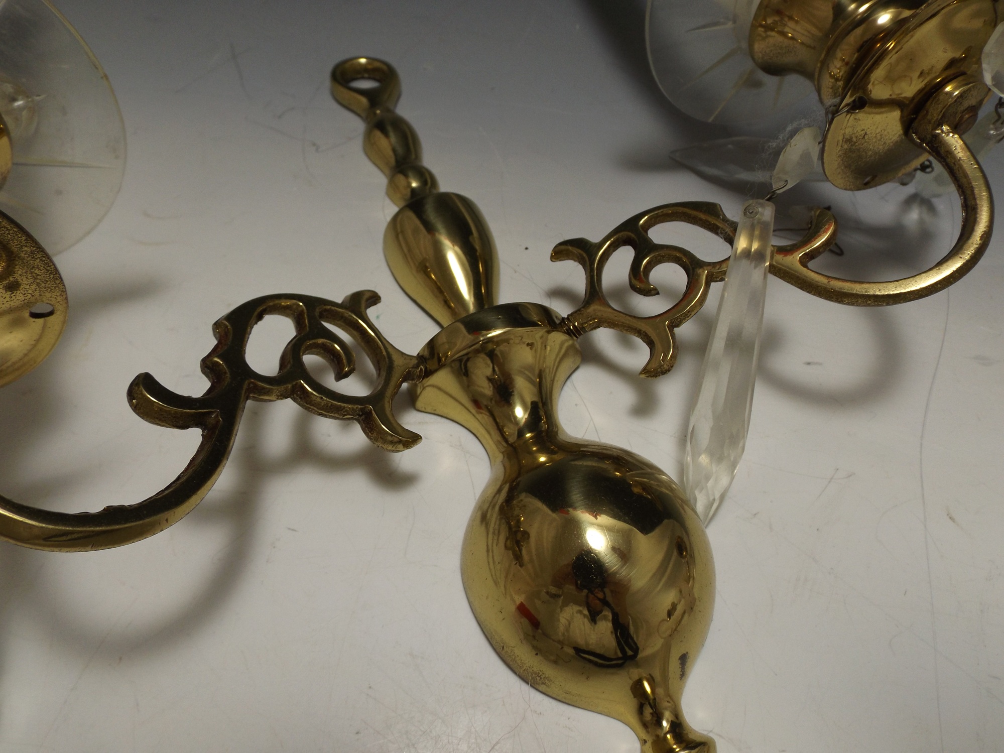 Pair of Polished Brass Sconces with Crystal Prisms