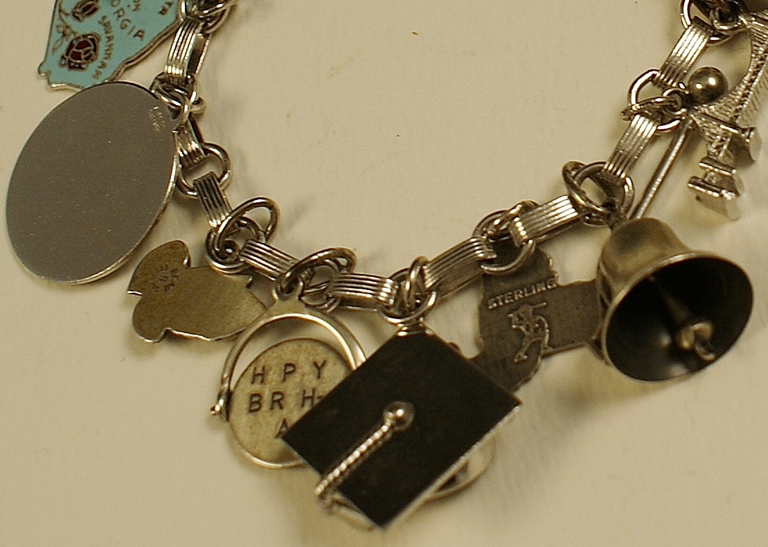 Interesting Vintage Sterling Charm Bracelet