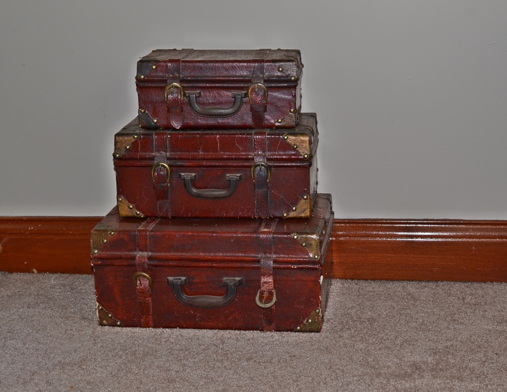 Group of Three Vintage Look Decorative Stacking Suitcases 