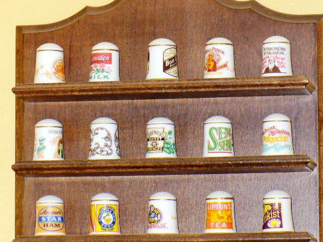 Wood Display Shelf with 25 Porcelain Thimbles