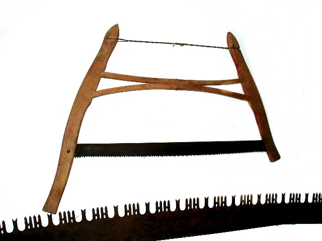 Four Vintage Two-Man and Single-Person Wooden Handled Saws