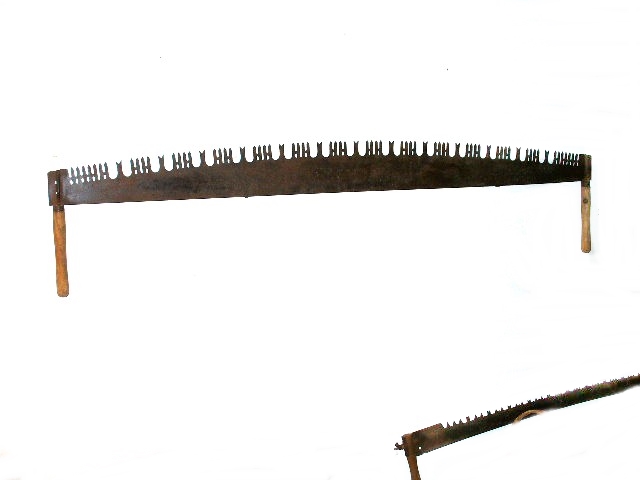 Four Vintage Two-Man and Single-Person Wooden Handled Saws