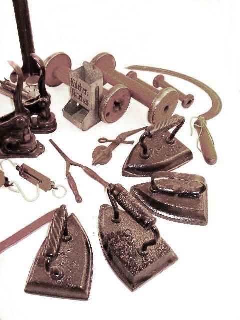 Variety of Vintage and Antique Cast Iron Implements and Tools