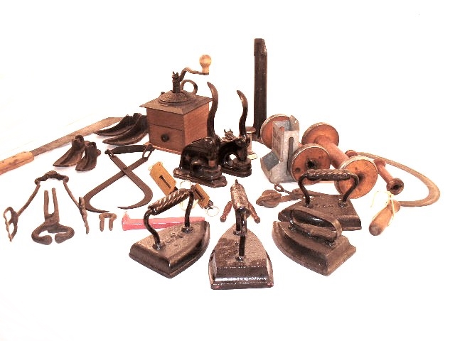 Variety of Vintage and Antique Cast Iron Implements and Tools